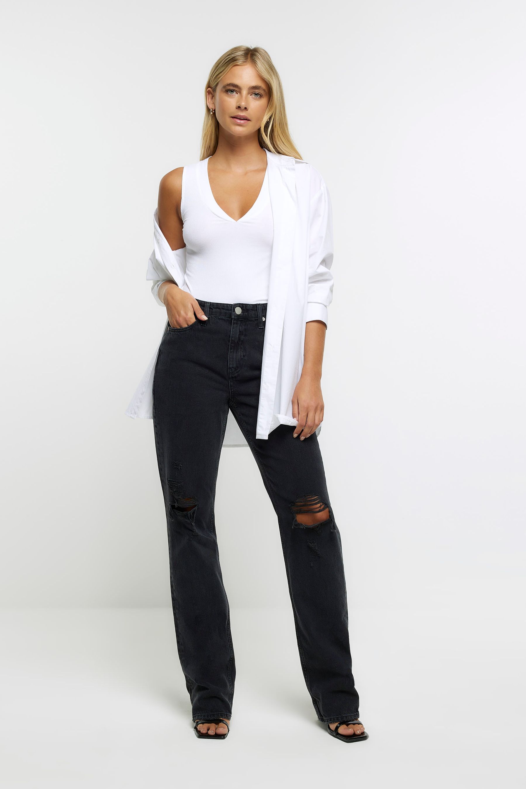Buy River Island Black High Rise Straight Ripped Jeans from the