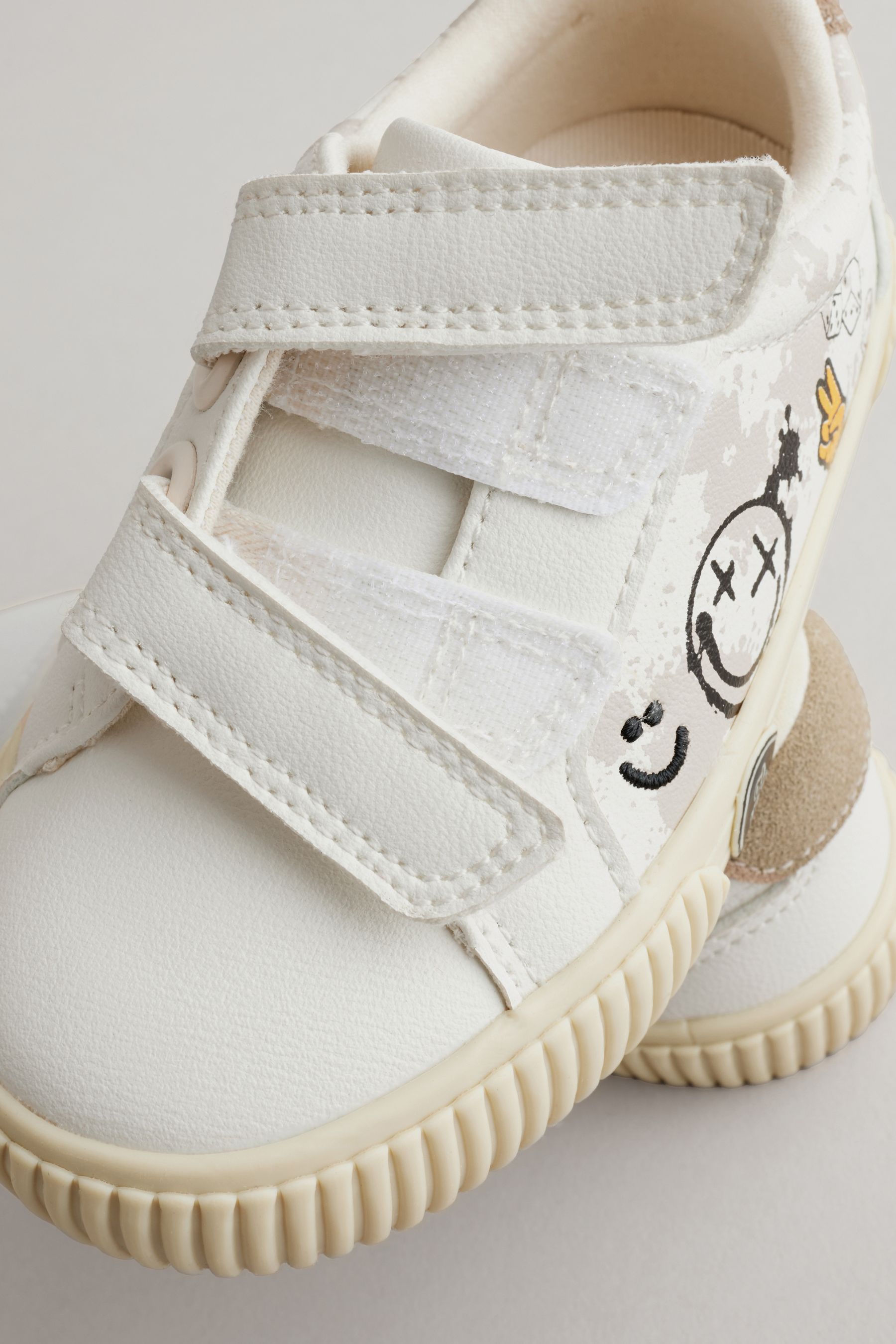 Converse strap shoes white top