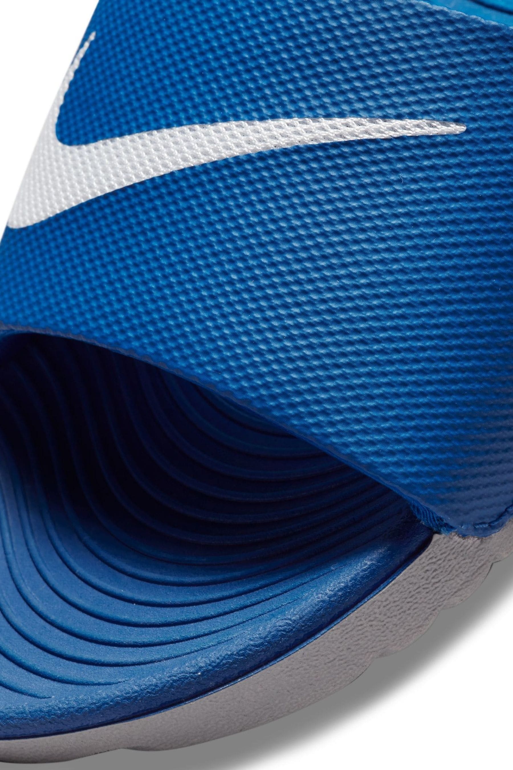 Buy Nike Blue White Kawa Junior Youth Sliders from the Next UK