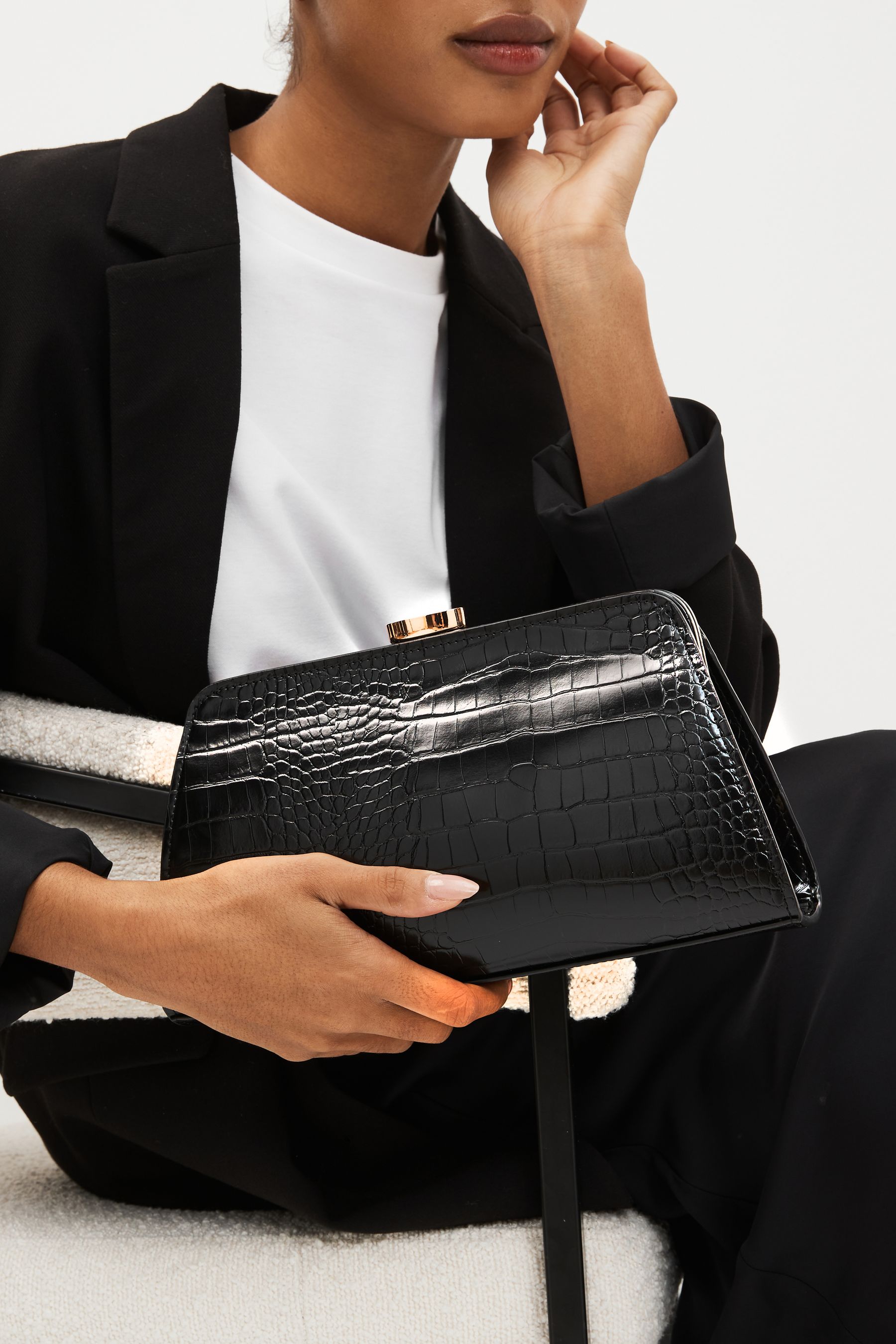 Next black clutch 2025 bag