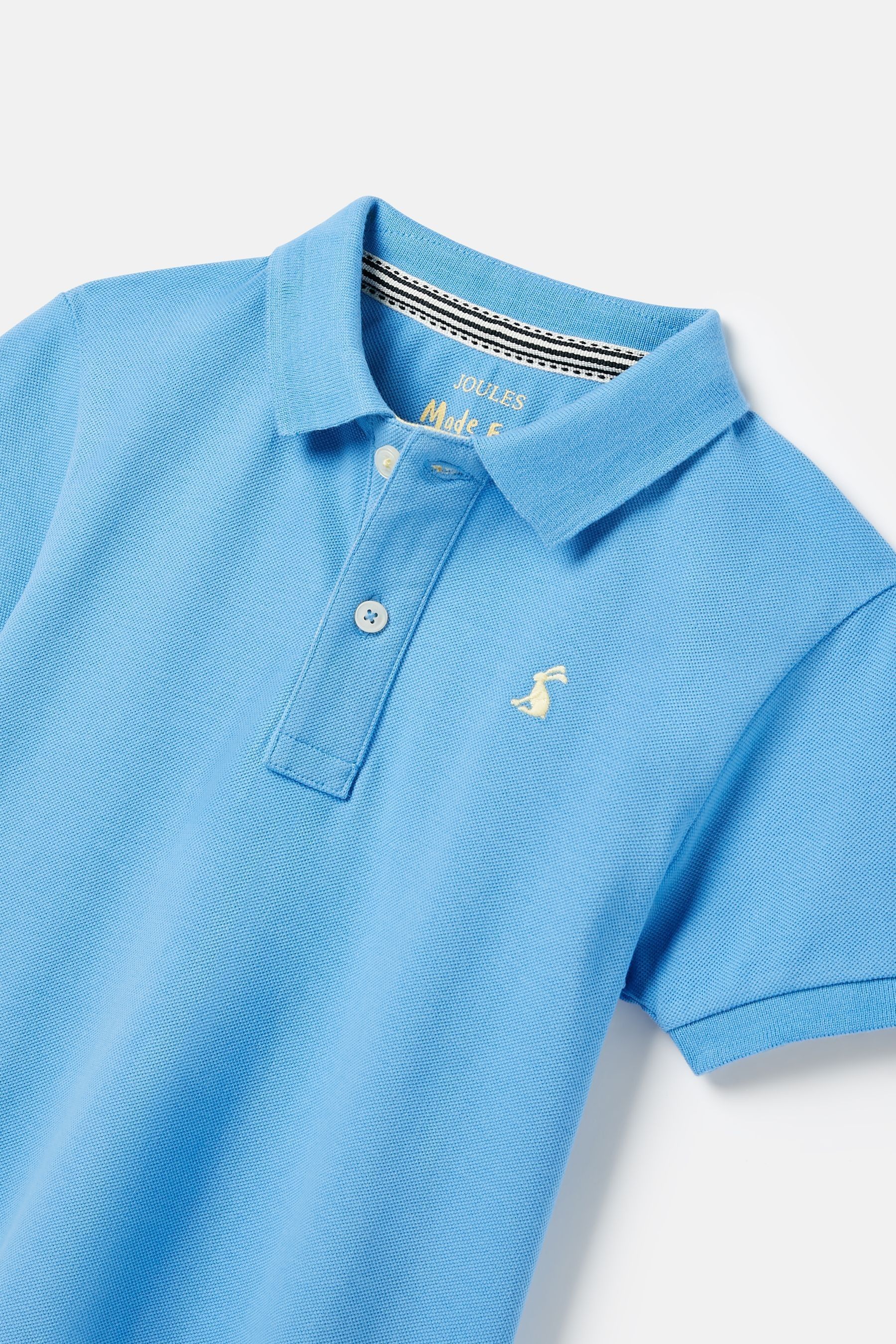 Buy Joules Boys Woody Blue Pique Cotton Polo Shirt from the Next UK online shop