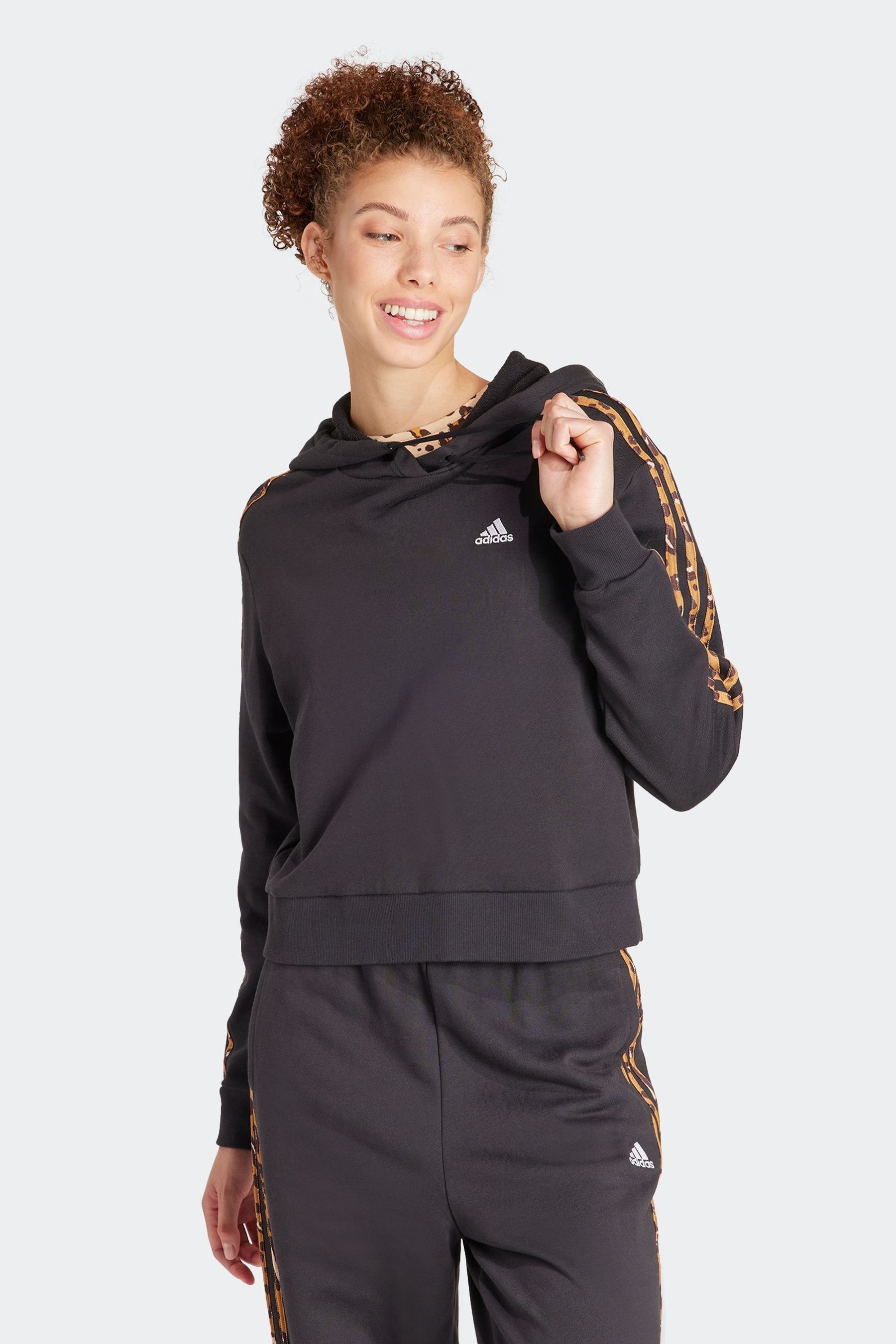Buy adidas Black 100 Cotton Sportswear Essentials 3 Stripes Animal Print Relaxed Hoodie from Next Luxembourg