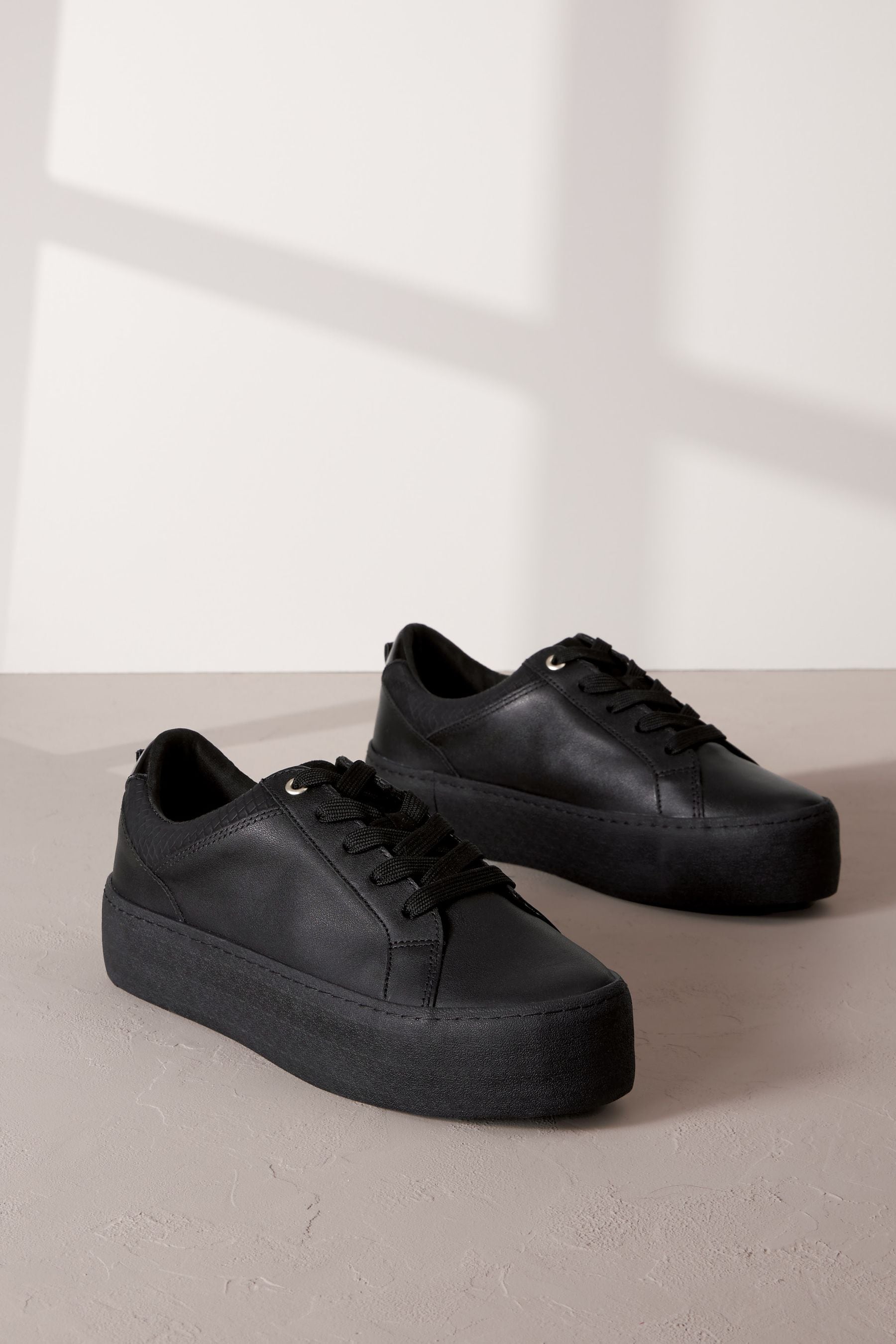 Chunky sole black trainers clearance