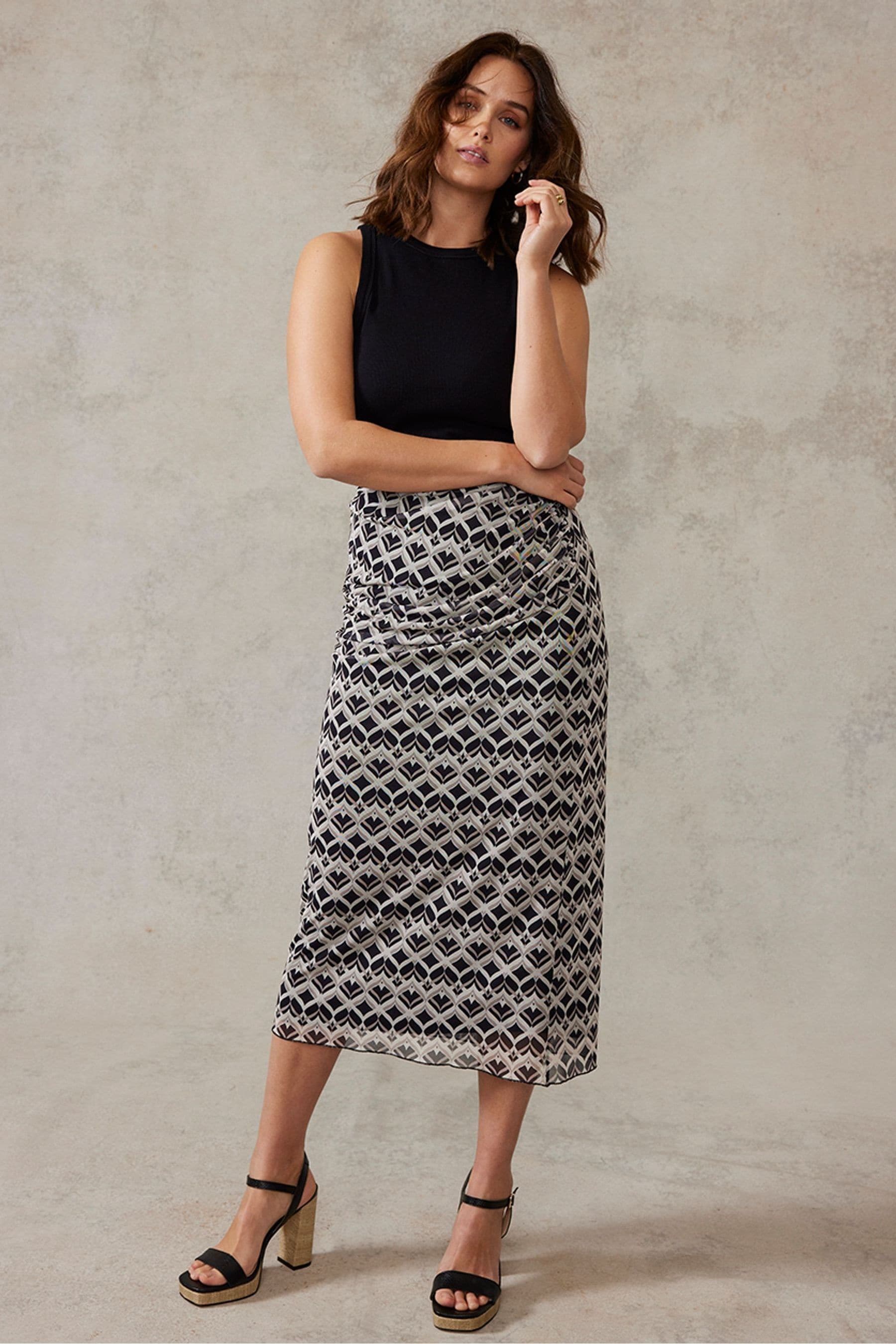 Buy Mint Velvet Black Print Alyssa Midi Skirt from Next Luxembourg