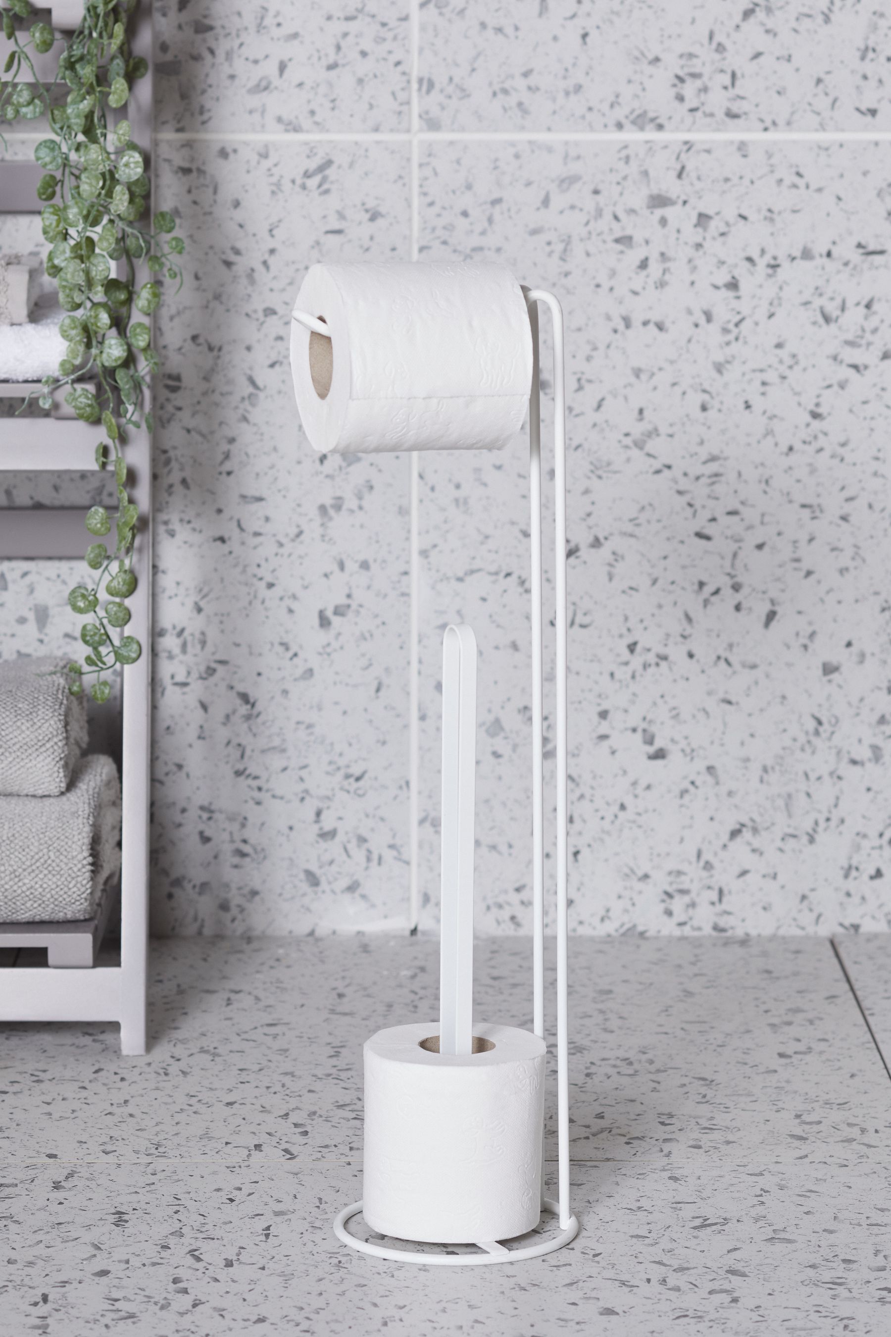 White toilet roll holder stand outlet