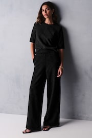 Black Boucle Textured Wide Trousers - Image 1 of 6