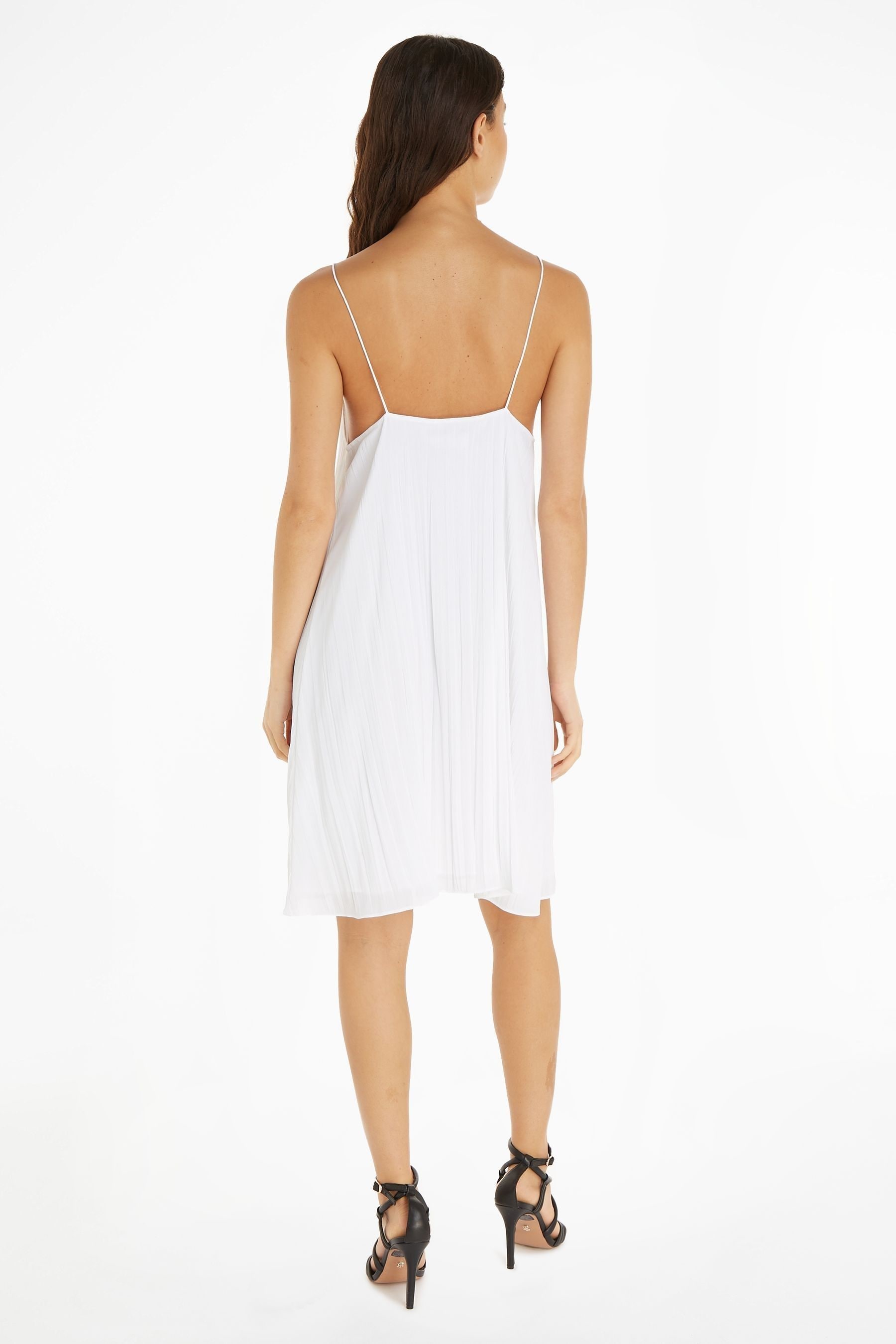 Buy Calvin Klein Textured Mini Slip White Dress from Next Luxembourg