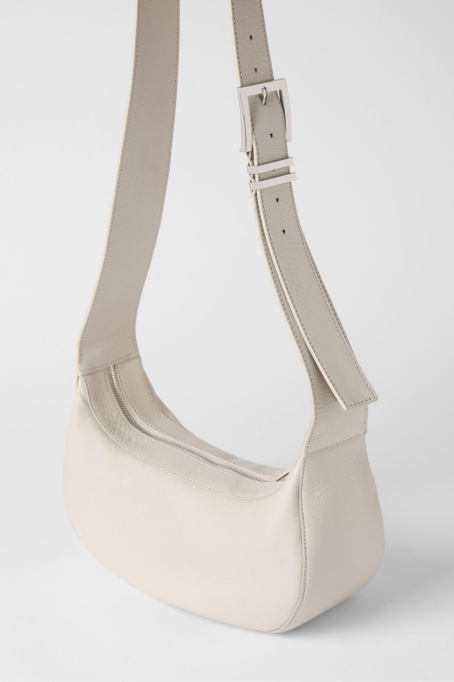 Cream leather cross body bag on sale