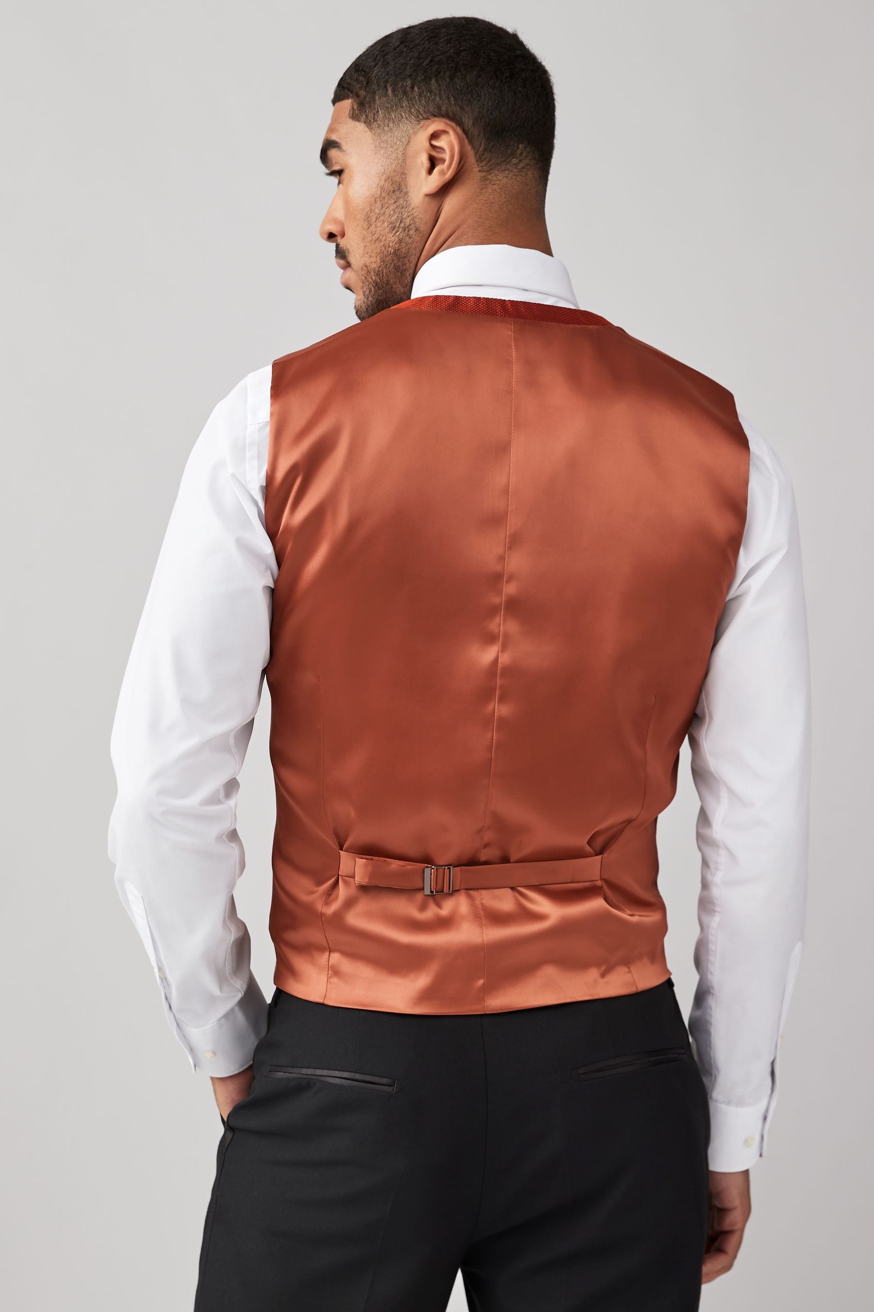 Buy Rust Orange Regular Fit Textured Waistcoat from Next Oman