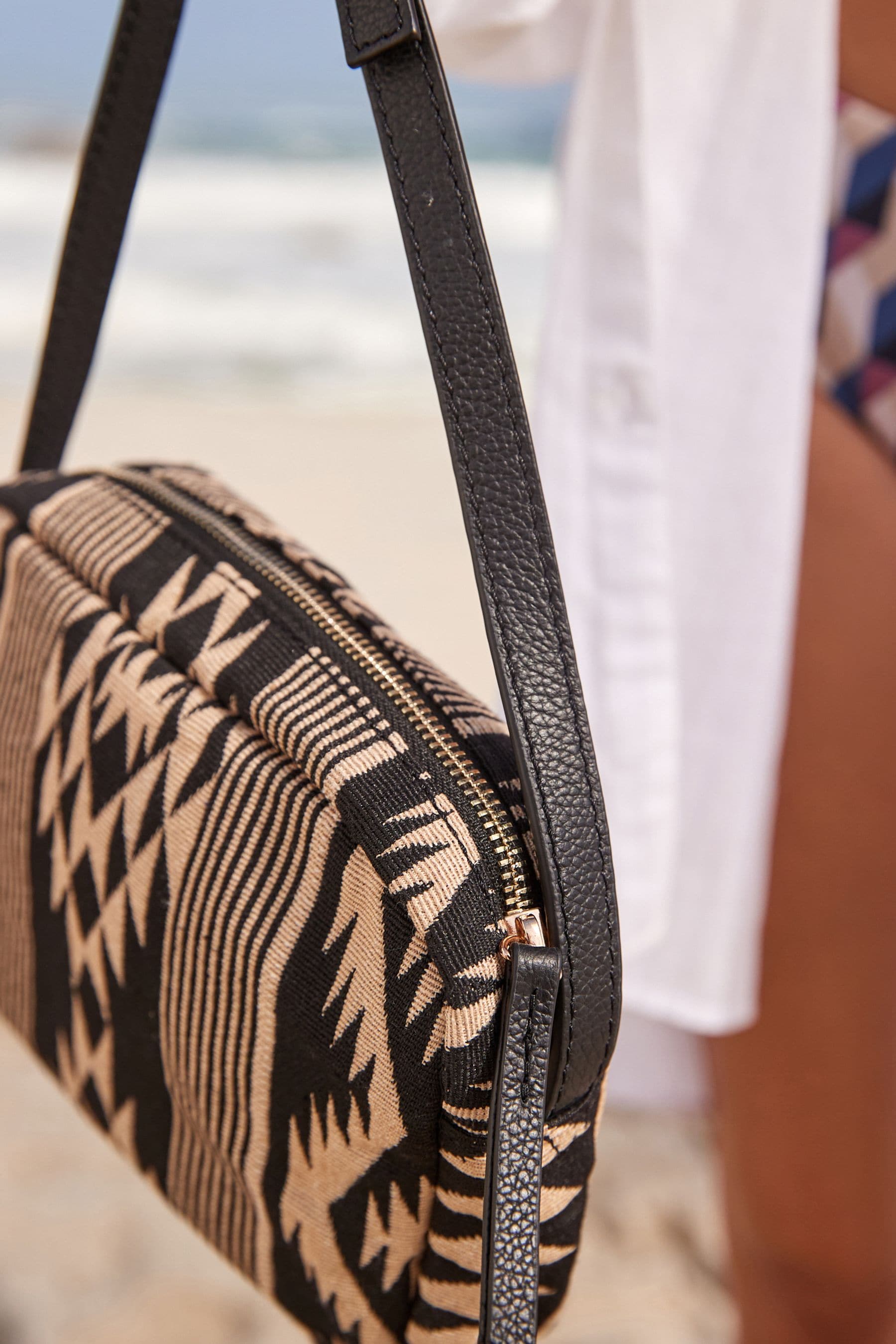 Material cross body bag discount
