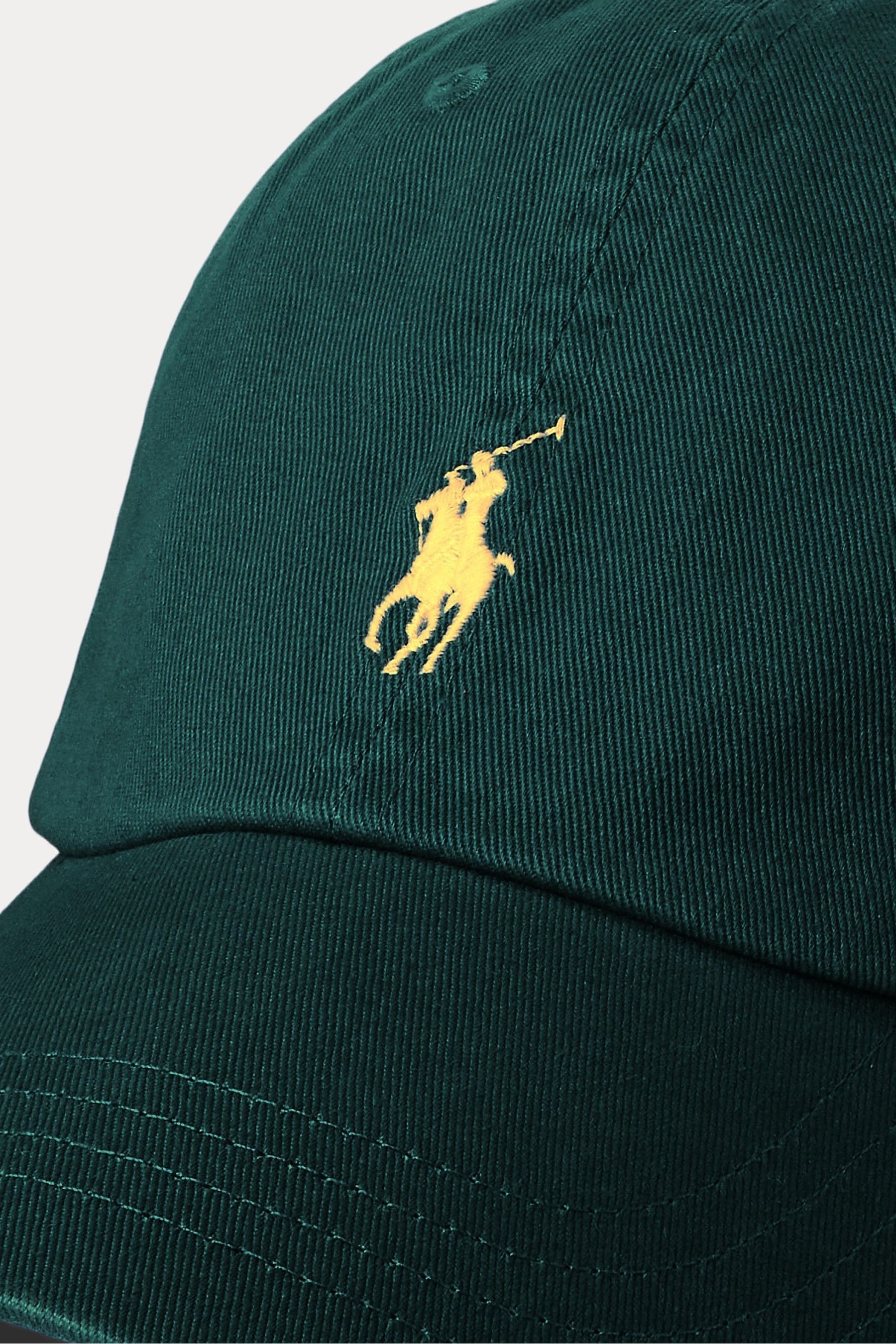 Green and yellow polo hat 2025