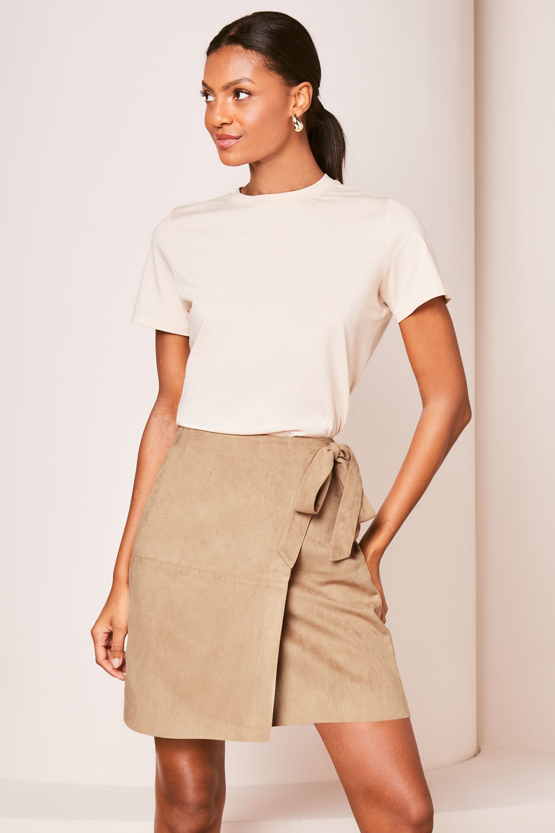 Buy Lipsy Tan Brown Suedette Wrap Mini Skirt from Next Luxembourg