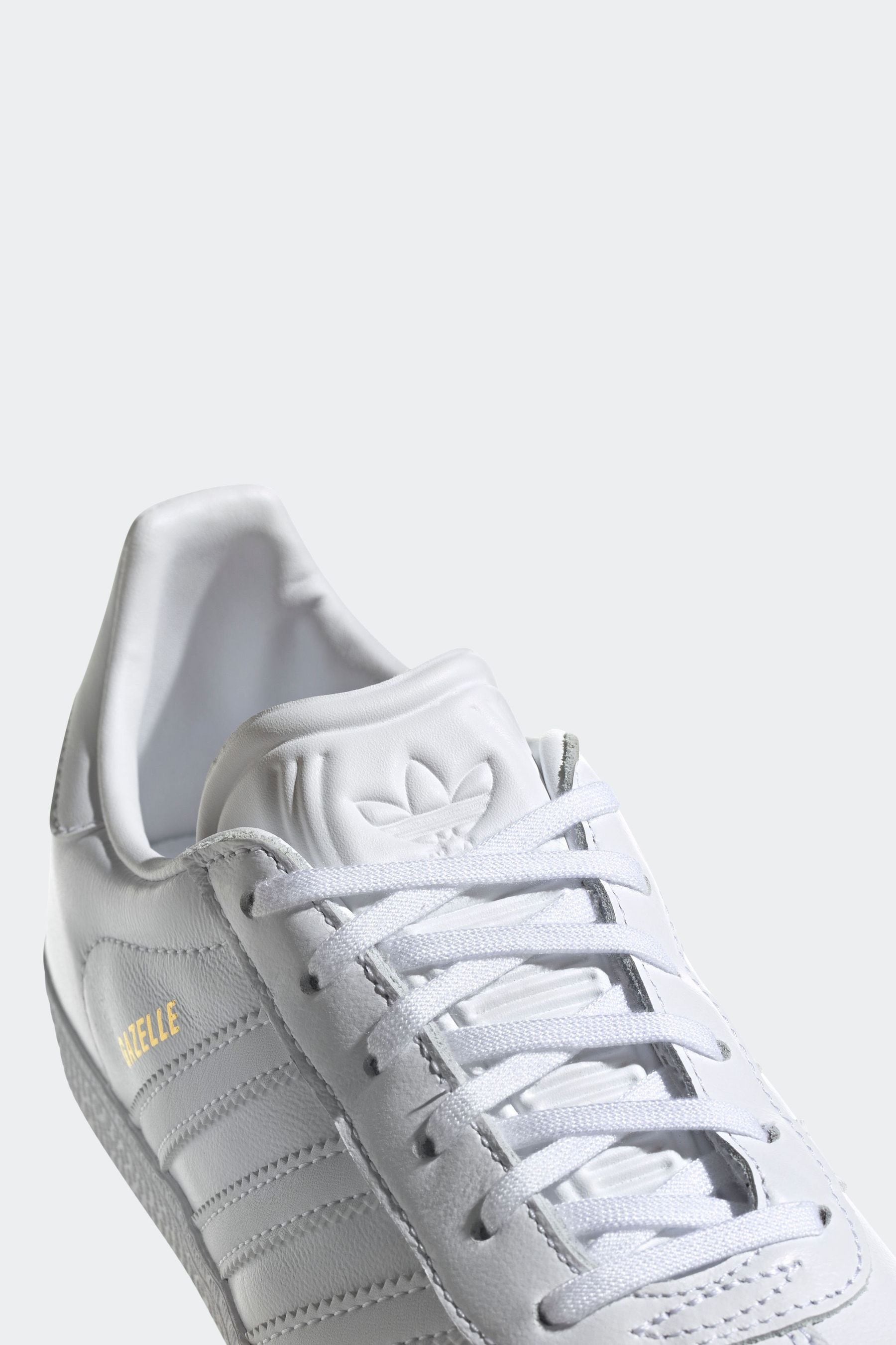 Grey adidas gazelle junior online