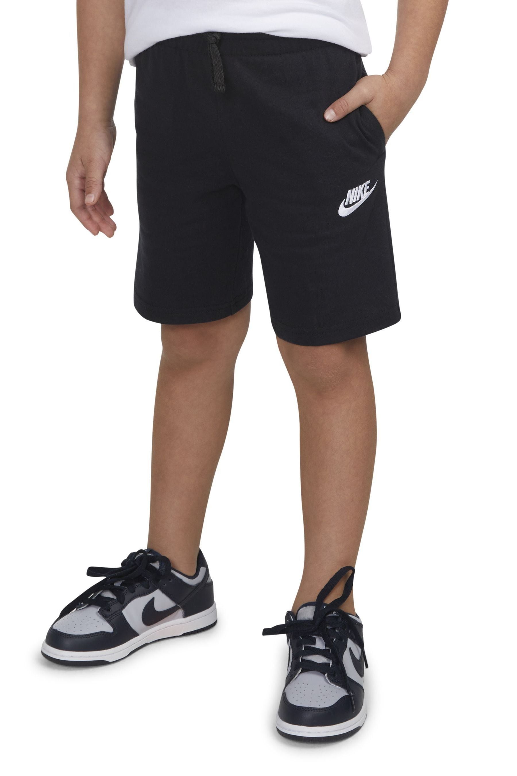 Kids black nike shorts online