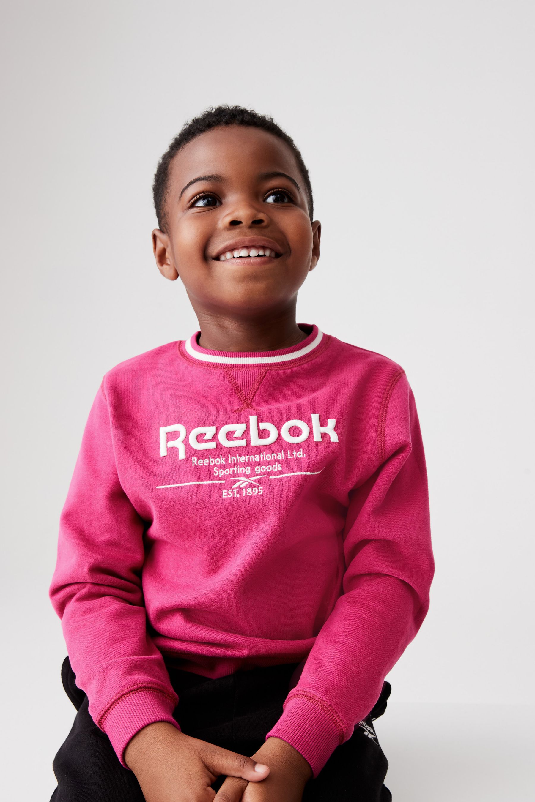 Pink online reebok sweater