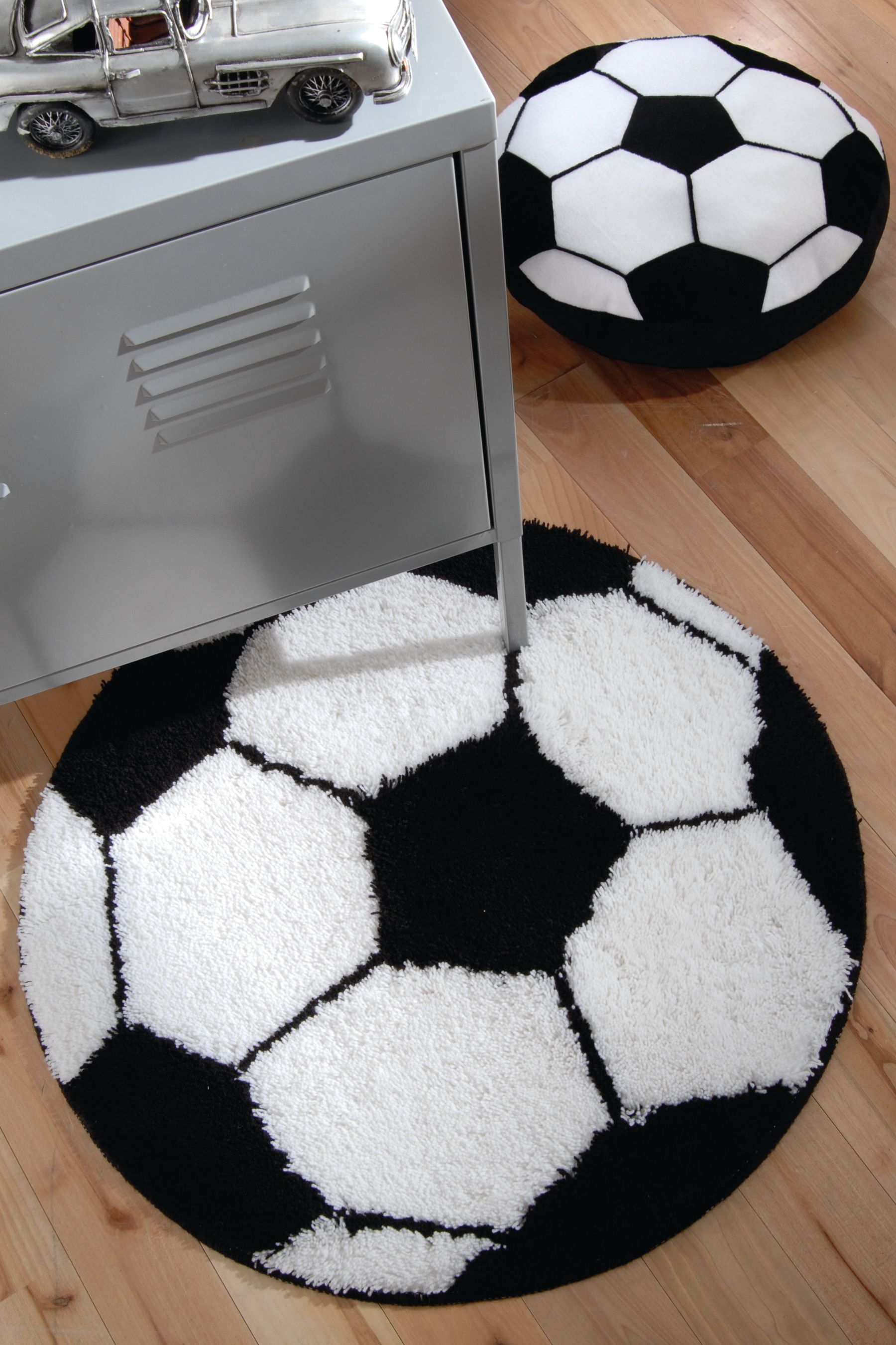 Buy Catherine Lansfield White Football Shaped Rug from the Next UK