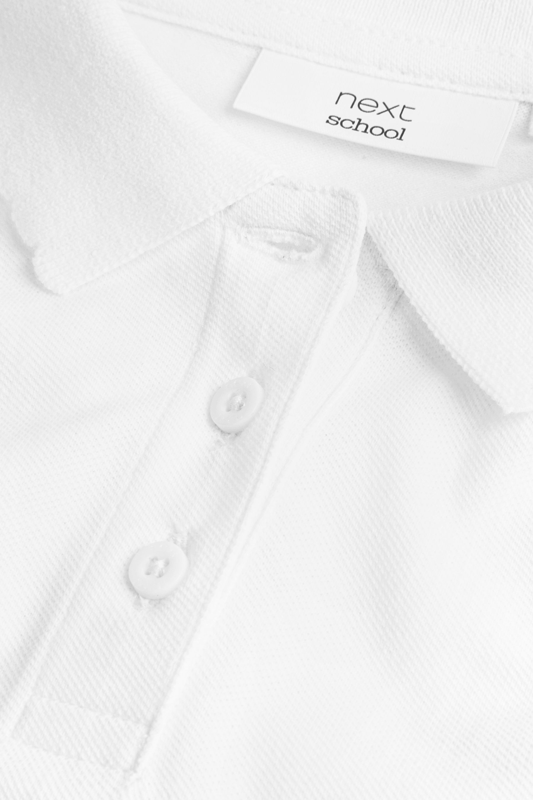 Buy White Regular Fit 100 Cotton Short Sleeve Polo Shirts 2 Pack 3 16yrs from the Next UK online shop