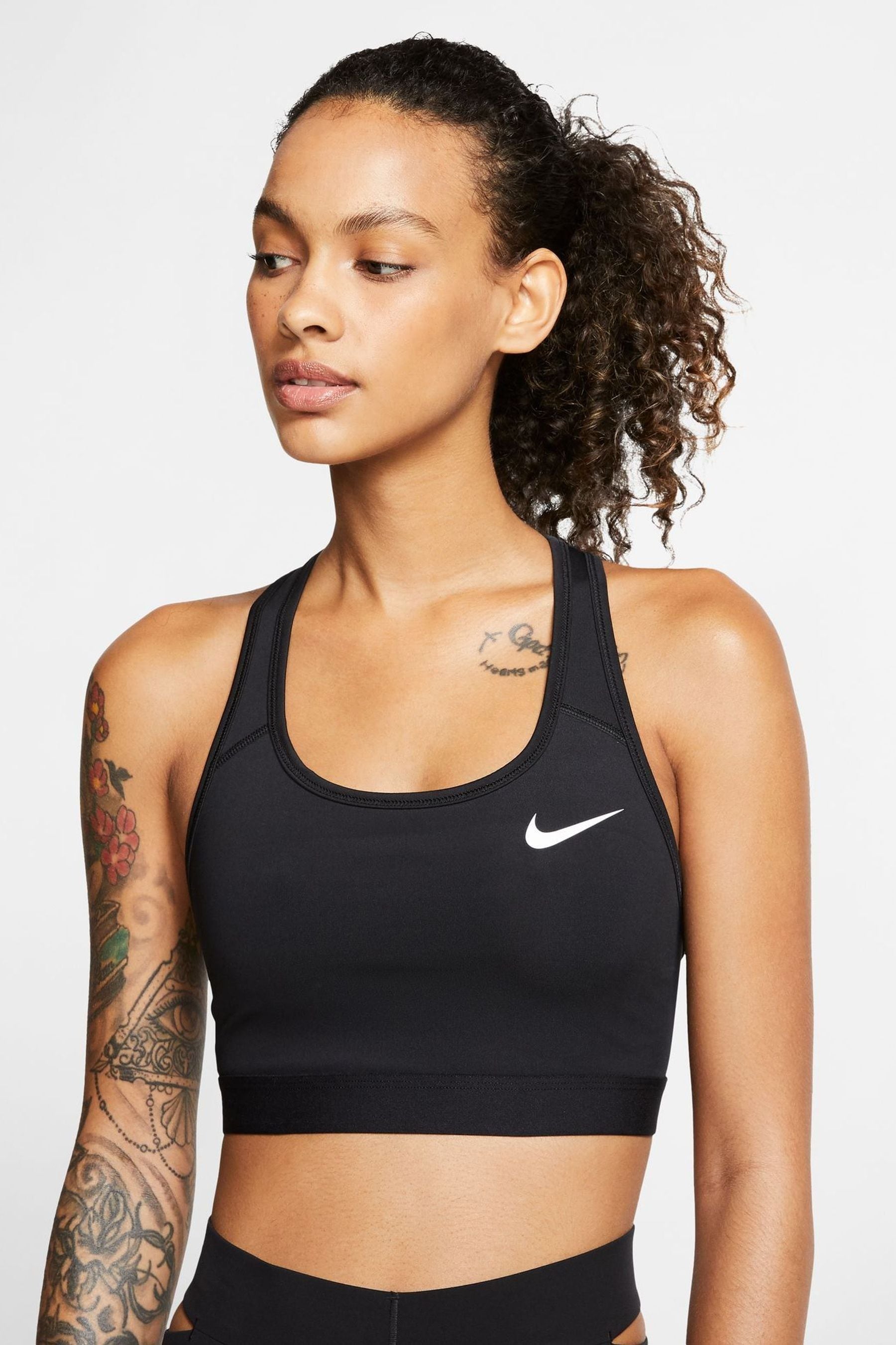 Buy Nike Black Nike Swoosh Medium Support Sports Bra from the Next UK online shop
