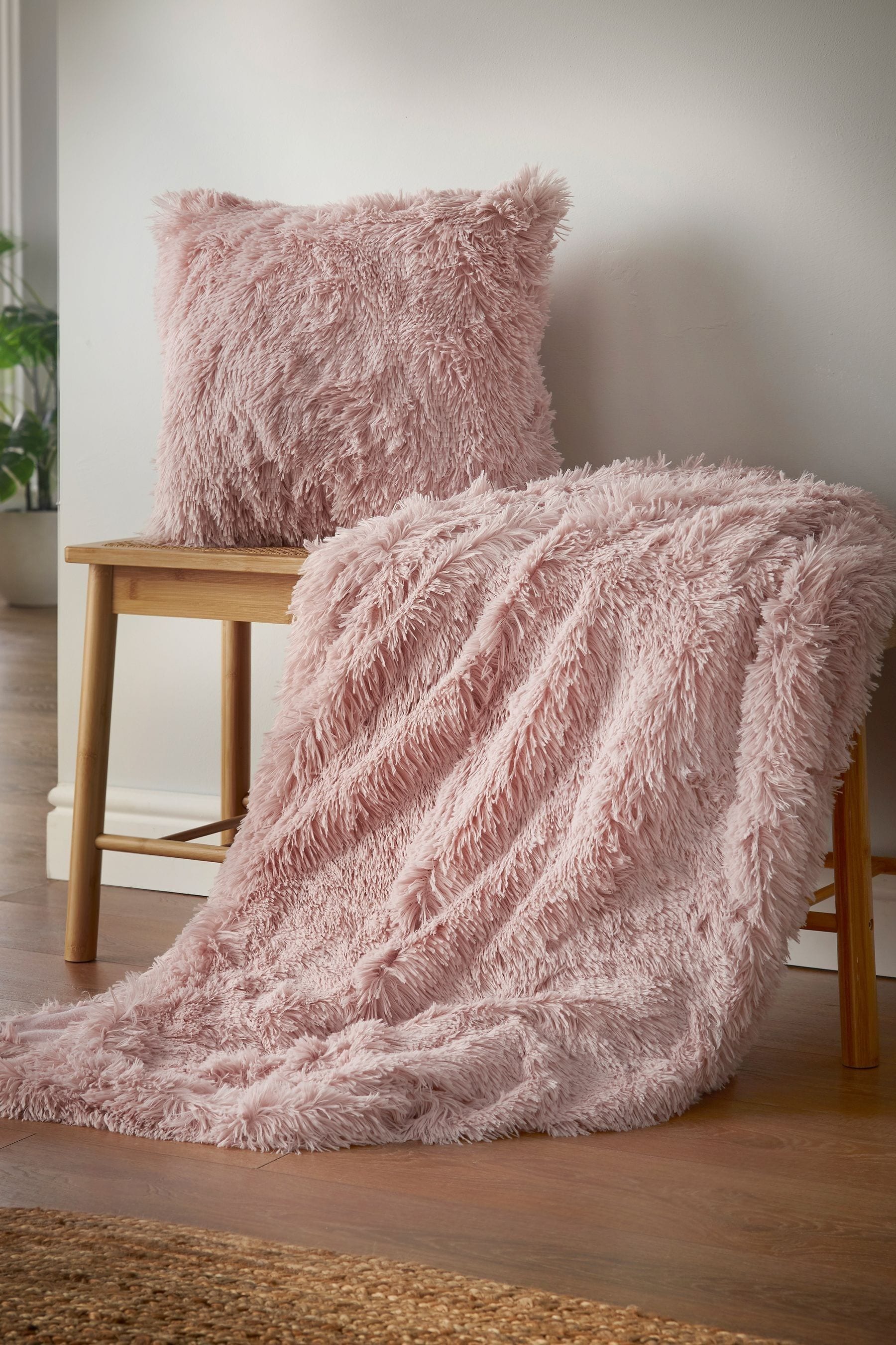 Pink shaggy cushion deals
