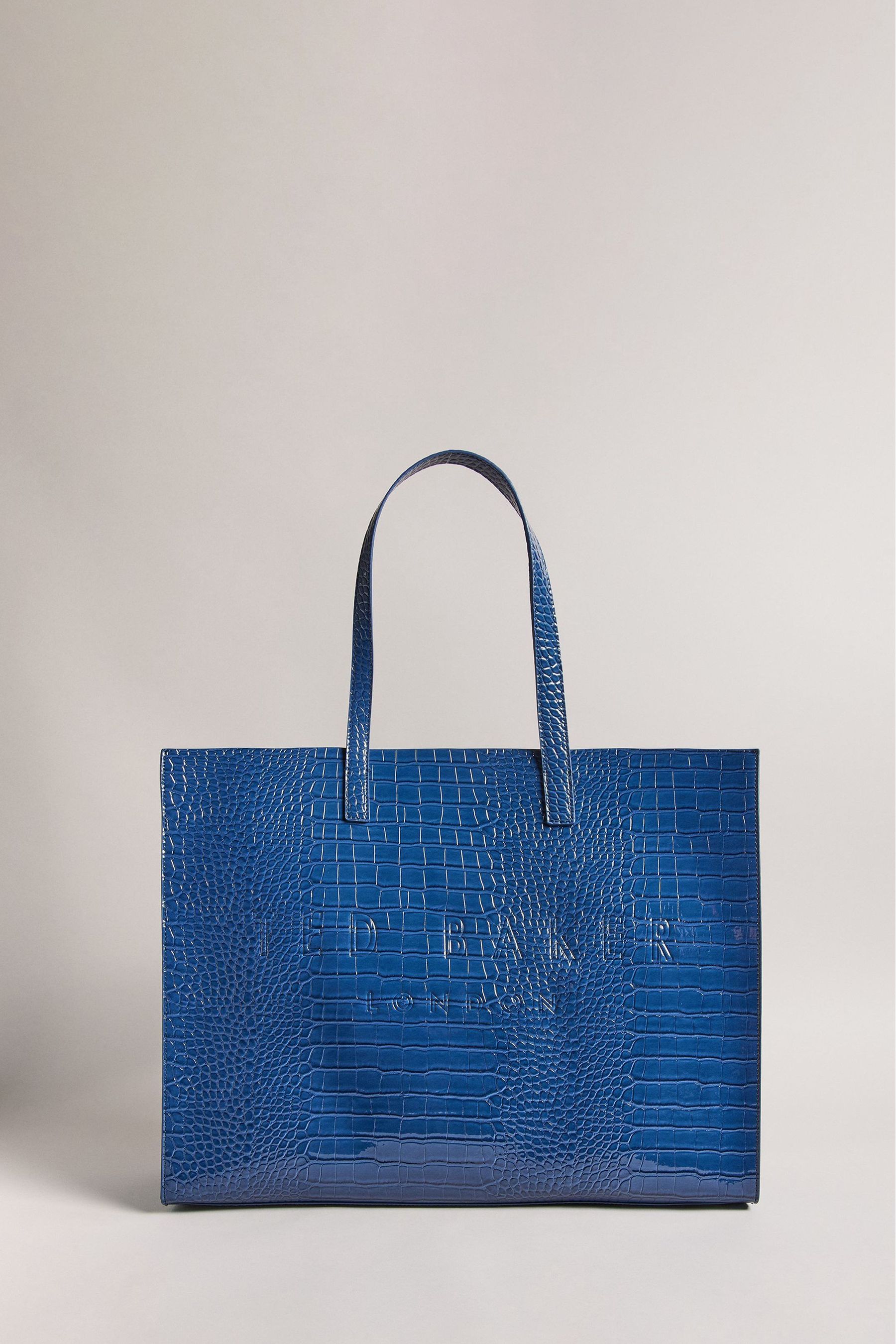 Buy Ted Baker Blue Allicon Croc Effect Detail Ew Icon Bag from Next Luxembourg
