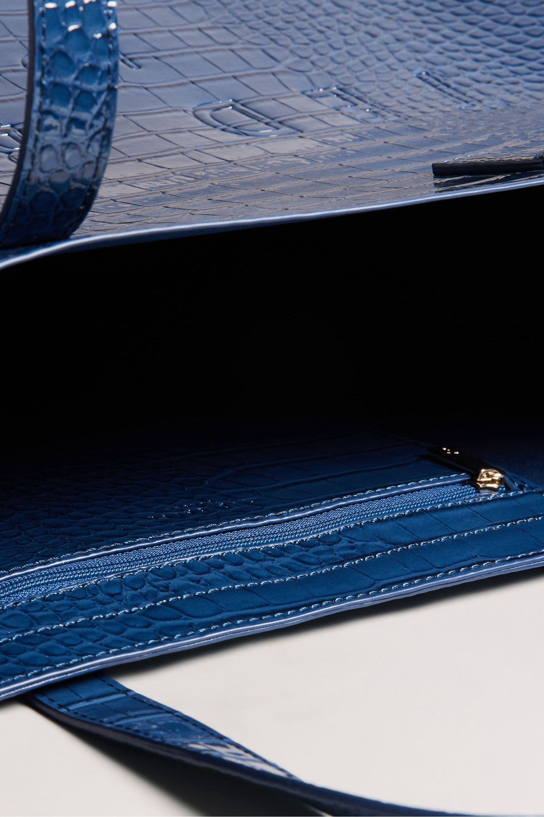 Buy Ted Baker Blue Allicon Croc Effect Detail Ew Icon Bag from Next Luxembourg