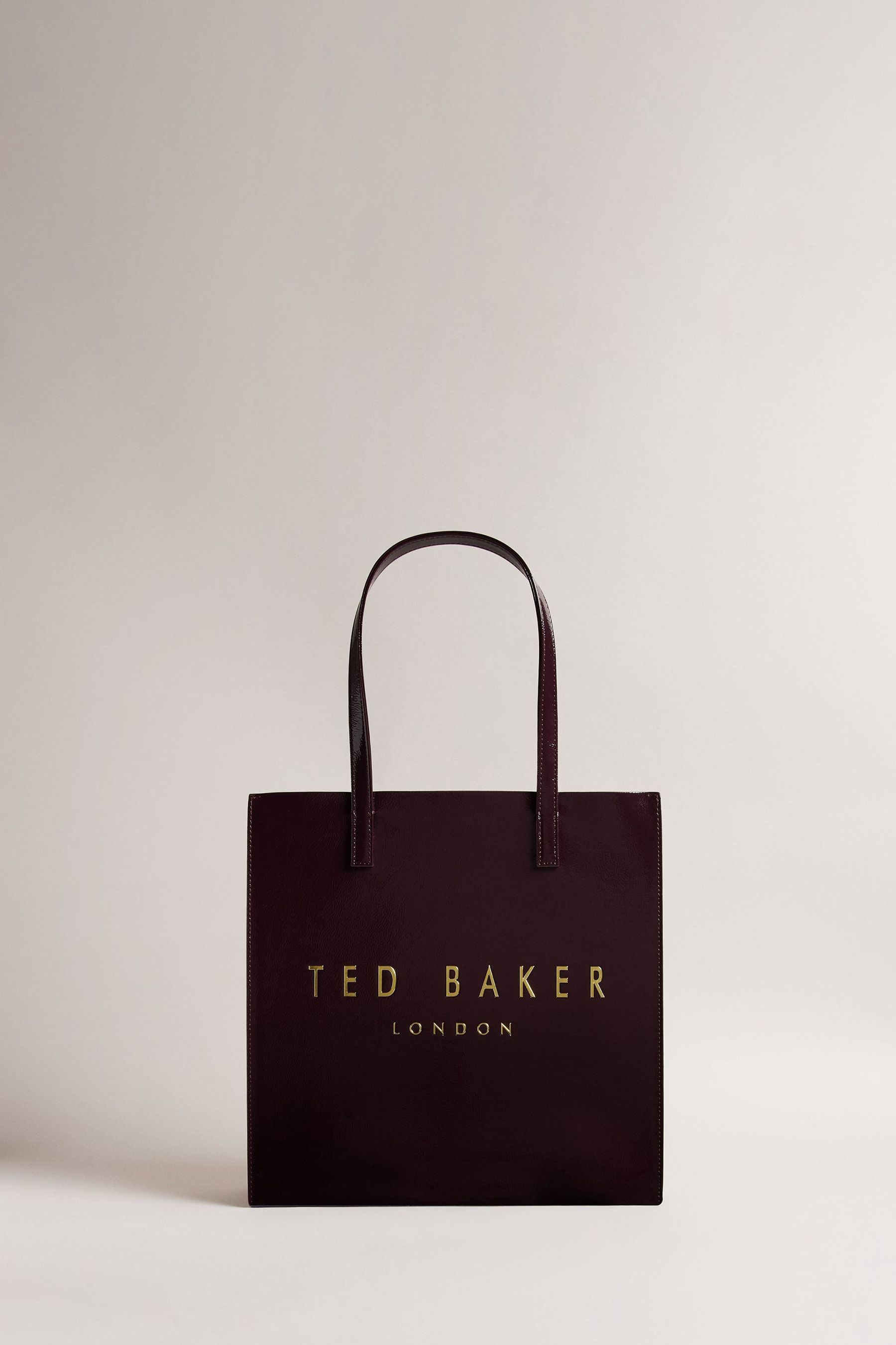 Burgundy ted baker purse on sale