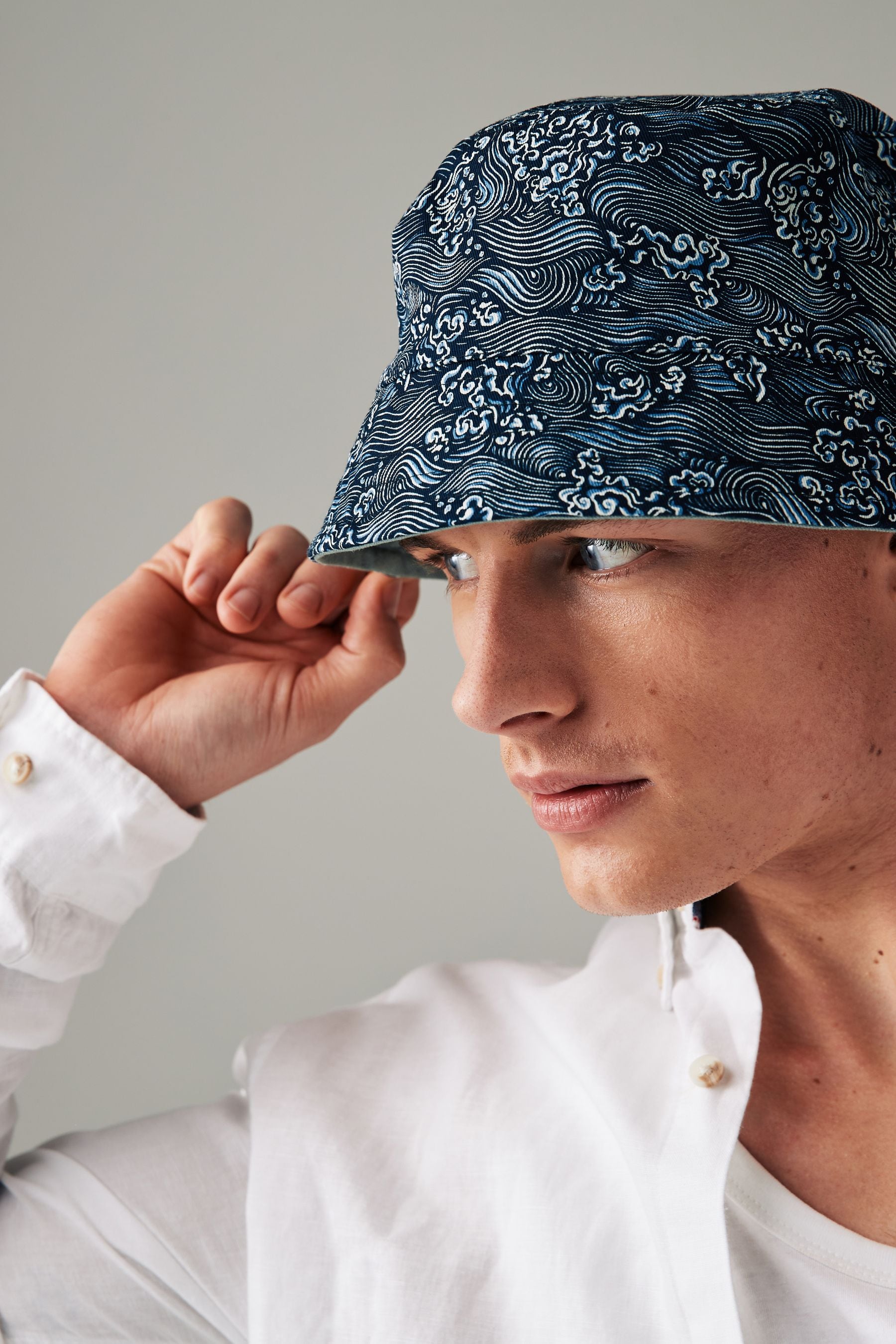Fish print bucket hat store