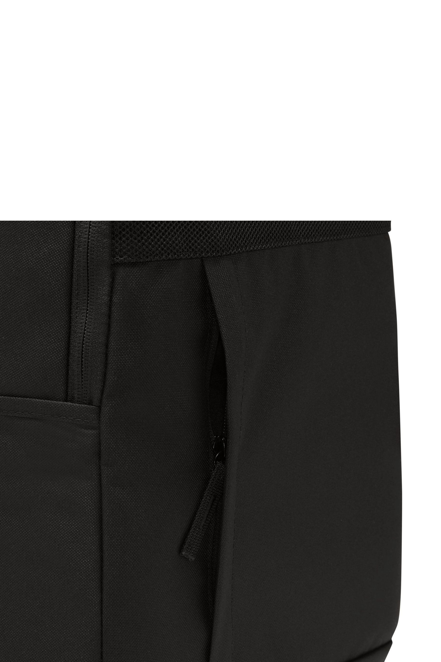 Black nike bag top with white tick