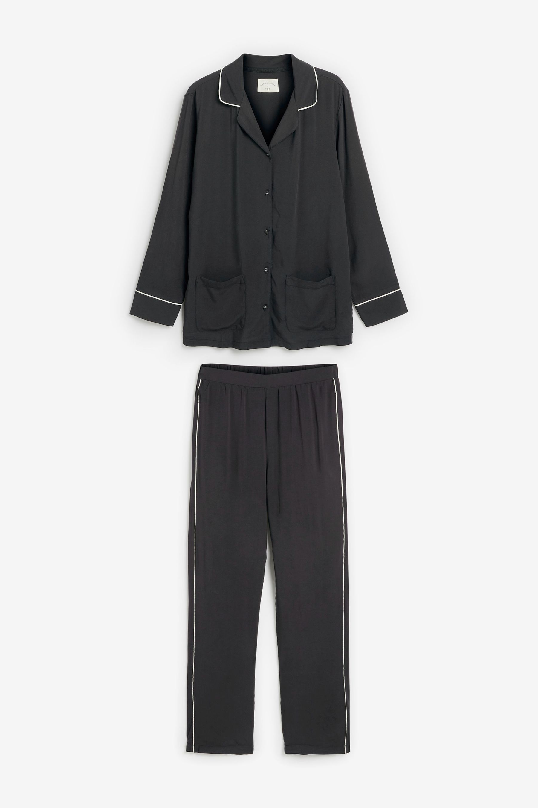 White pajamas with black piping 2025