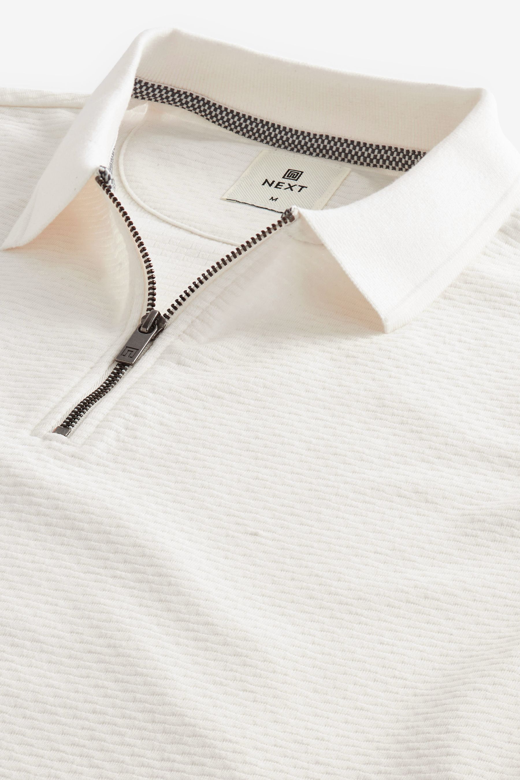Buy White Short Sleeve Textured Quarter Zip Polo Shirt from the Next UK online shop