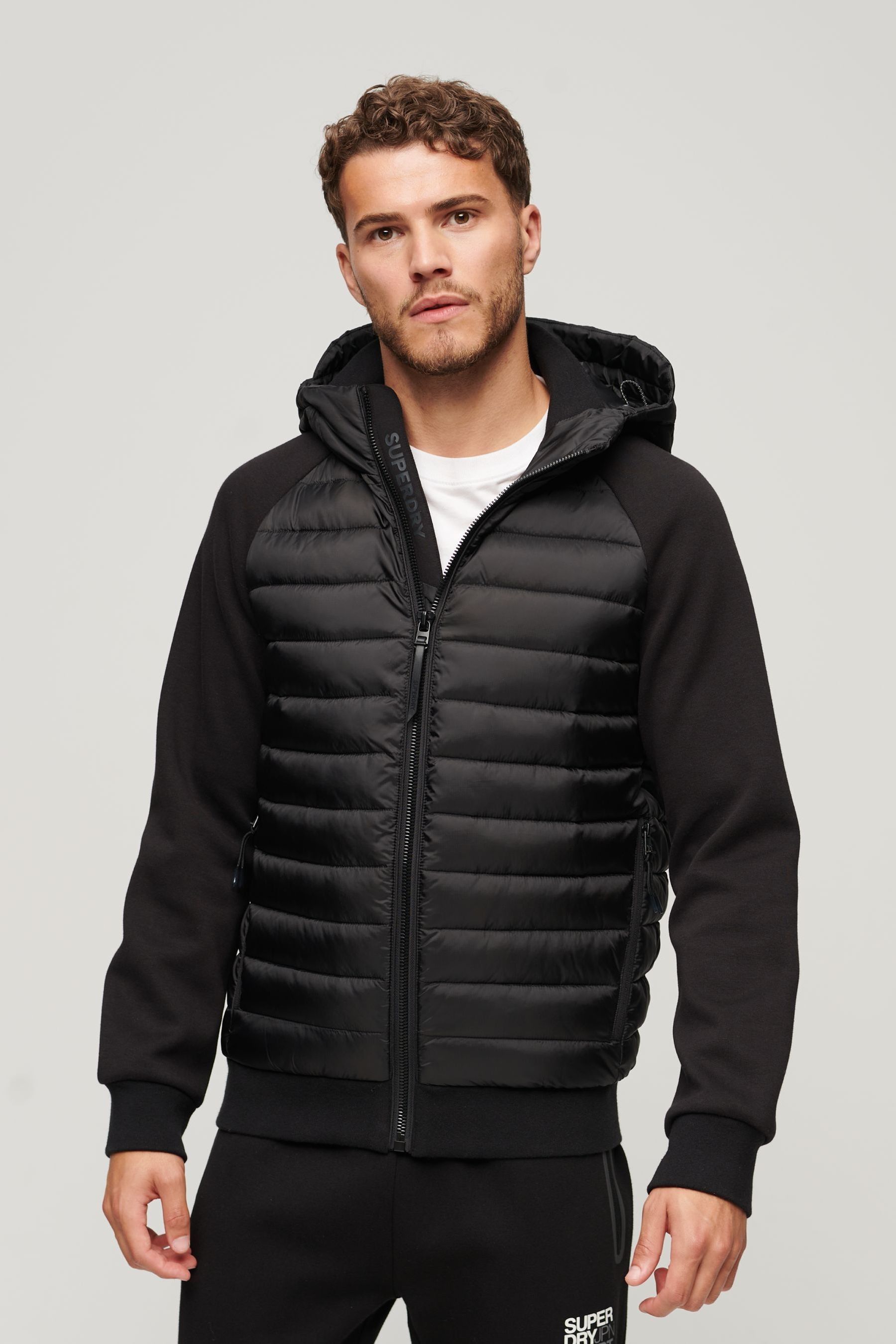 Buy Superdry Black Hooded Storm Hybrid Padded Jacket from Next Luxembourg