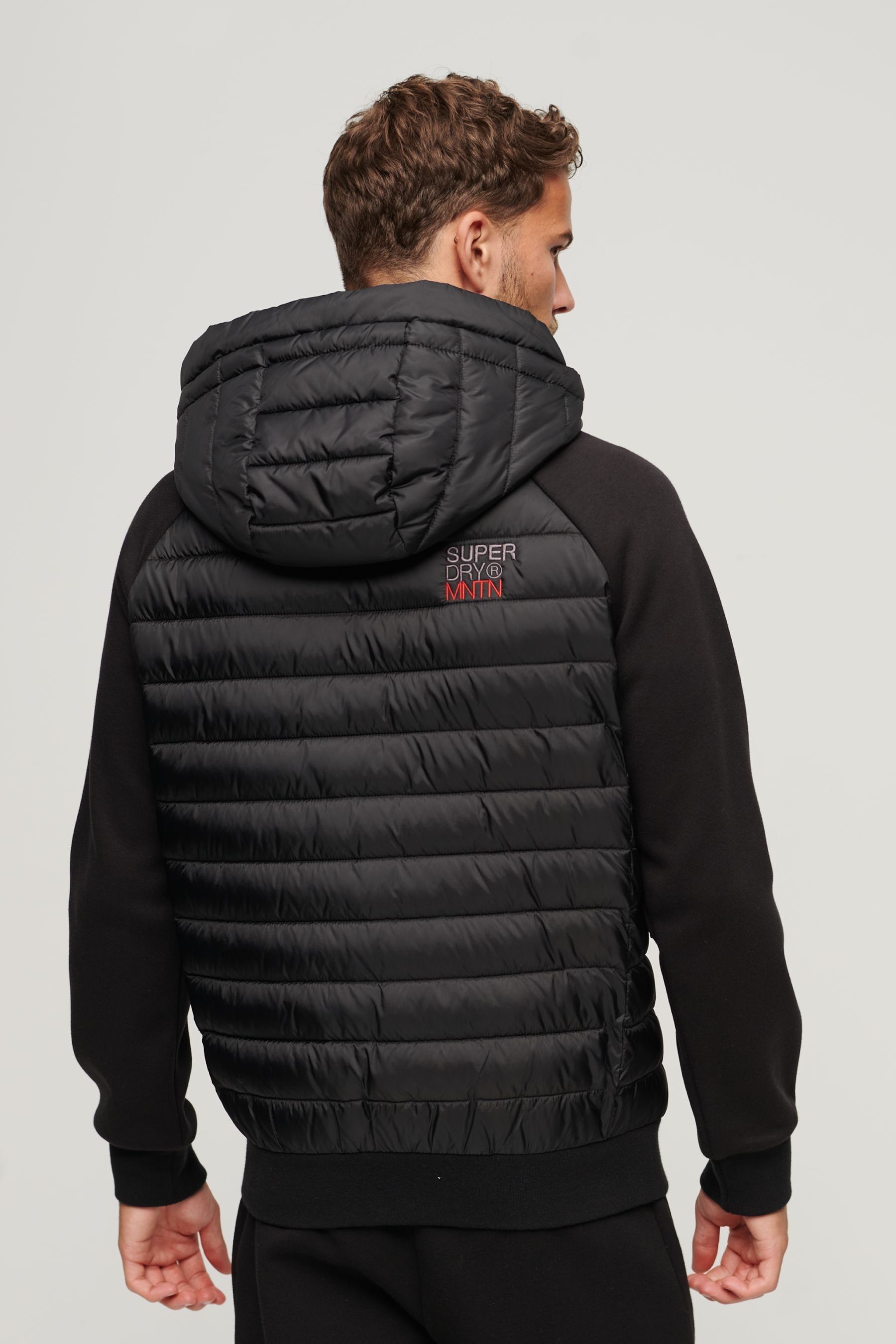 Buy Superdry Black Hooded Storm Hybrid Padded Jacket from Next Luxembourg