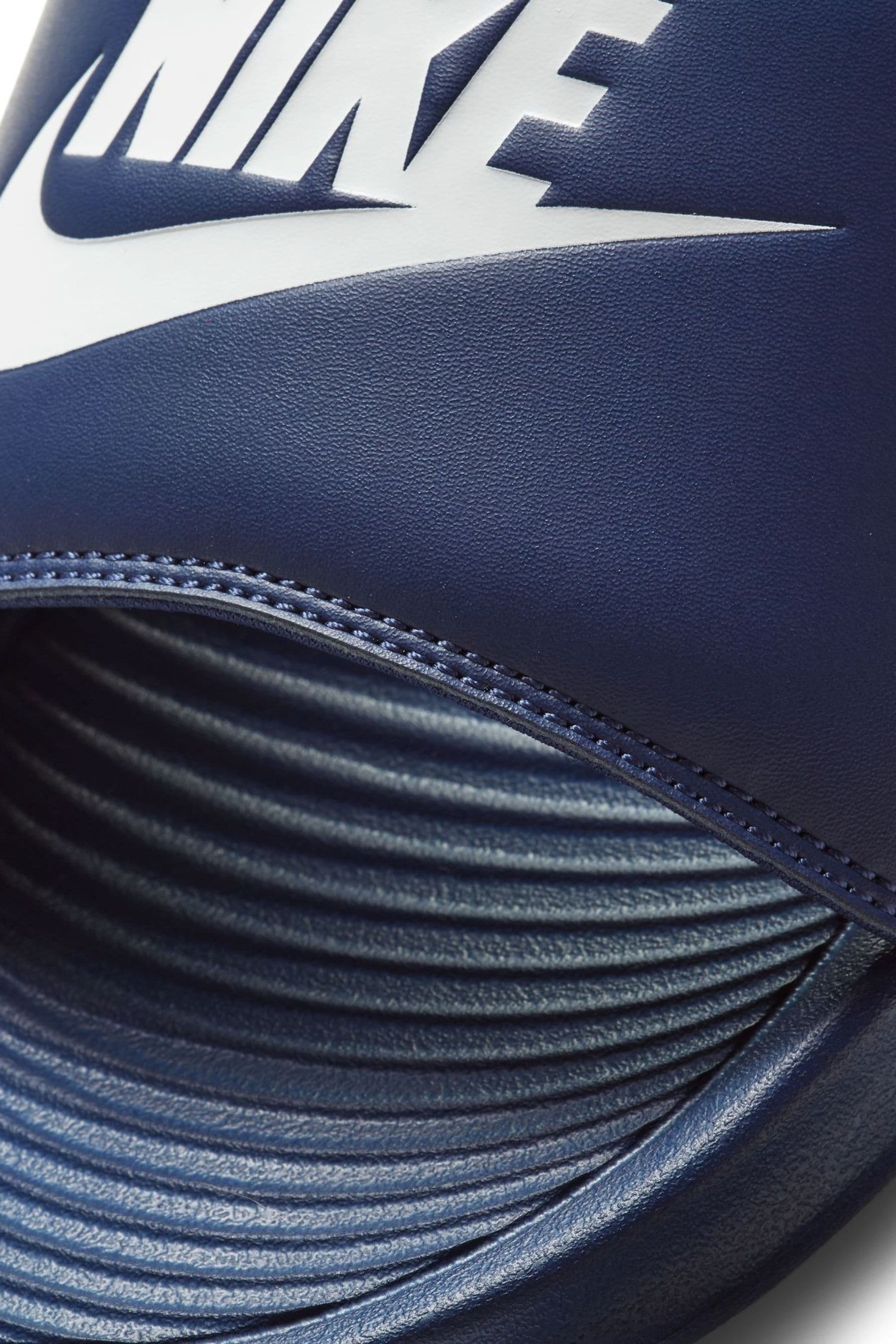 Navy nike sliders online