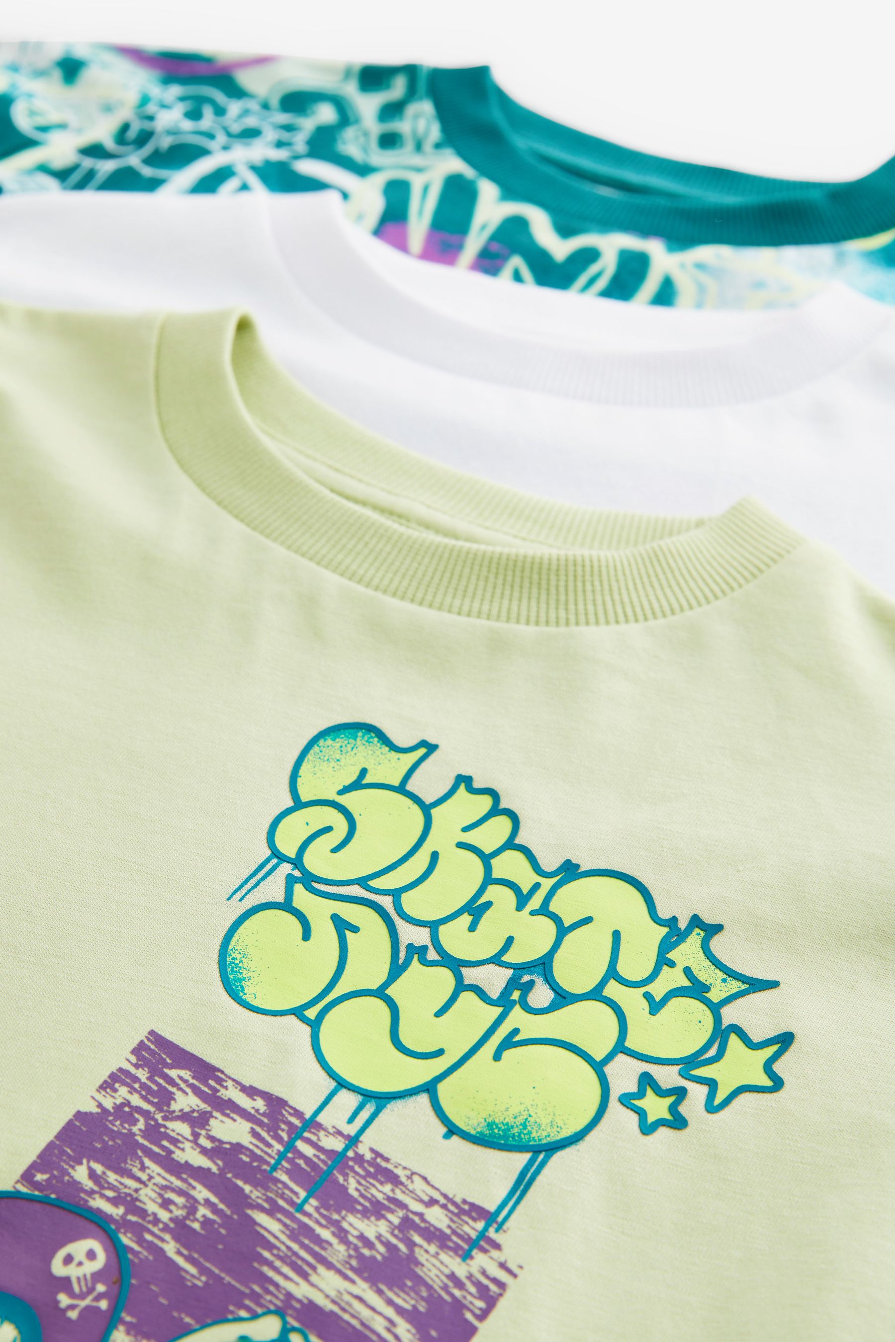 Buy Lime Green White Graffiti Relaxed Fit Graphic 100 Cotton Short Sleeve T Shirts 3 Pack 3 16yrs from the Next UK online shop