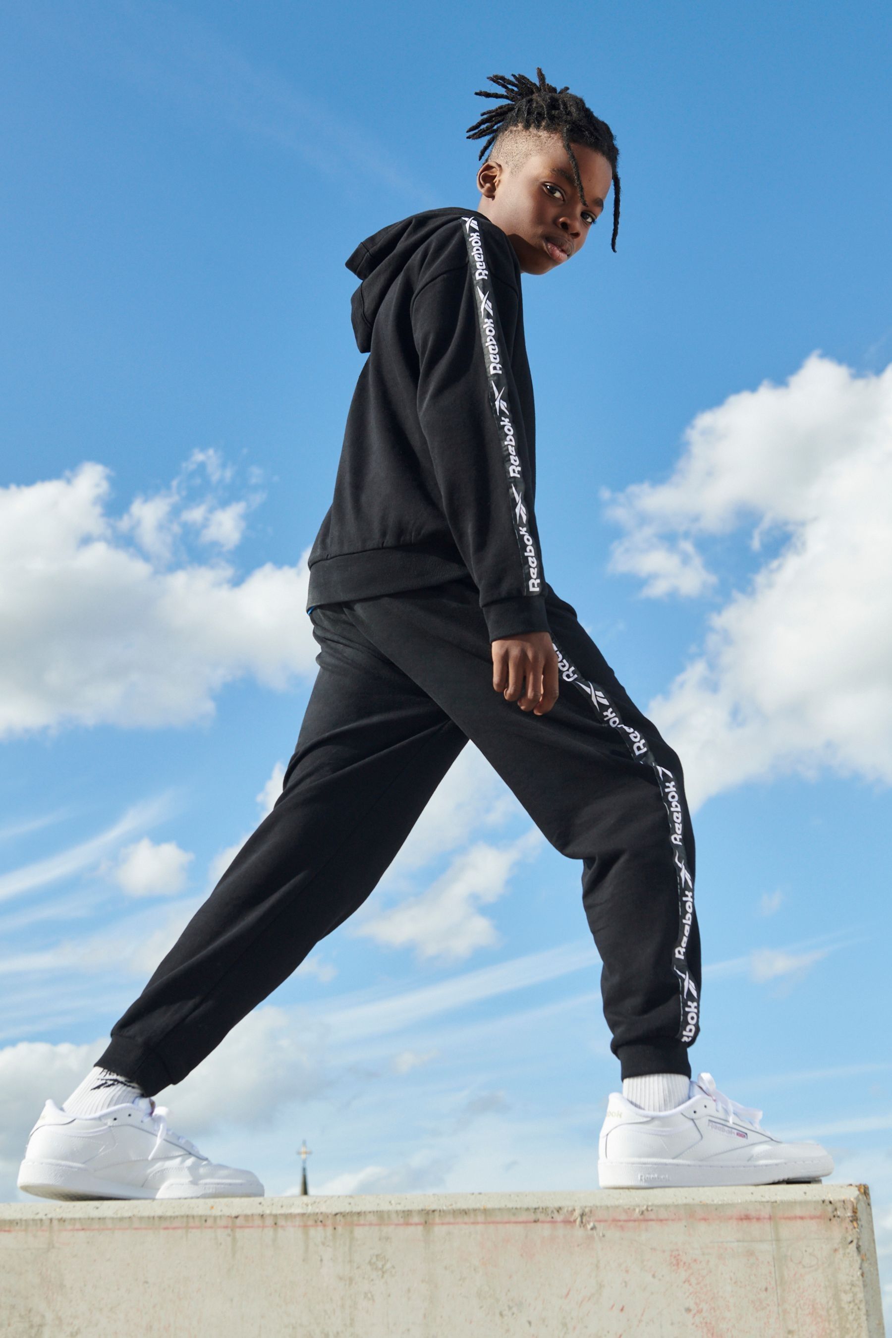 Buy Reebok Hoodie With Side Tape from the Next UK online shop