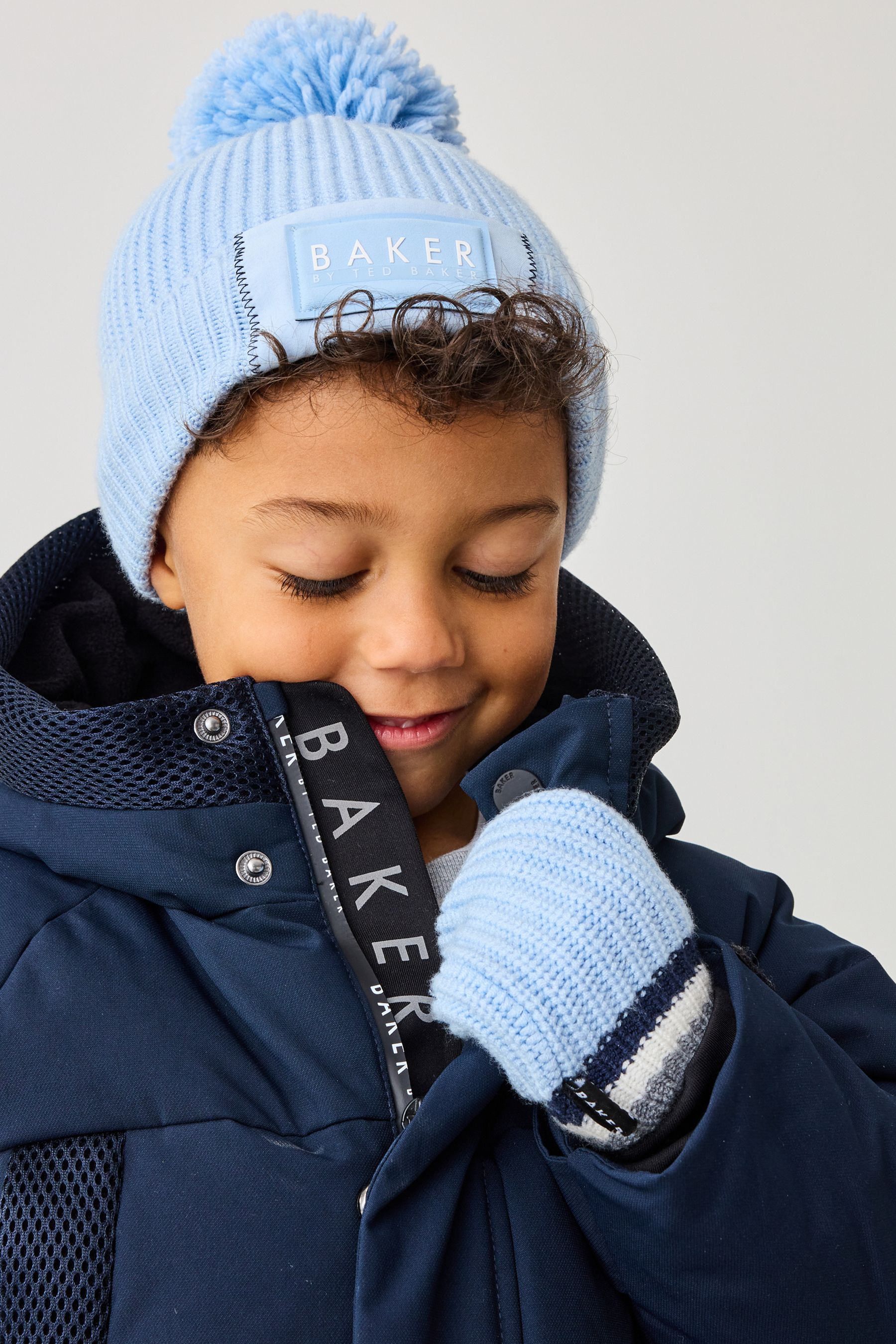 Buy Baker by Ted Baker Boys Navy Pom Beanie And Mittens Set from the Next UK online shop