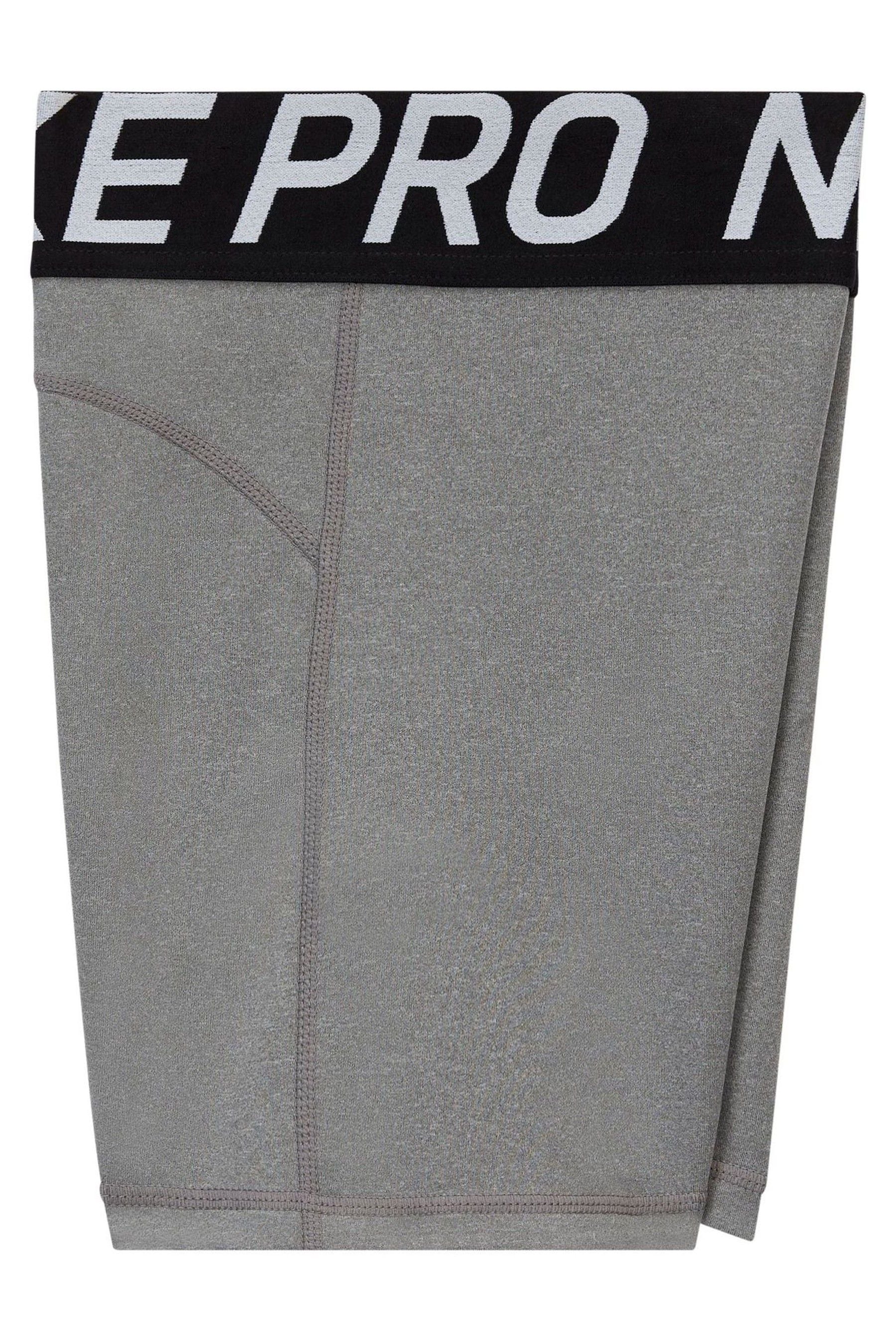 Nike pro shorts gray top