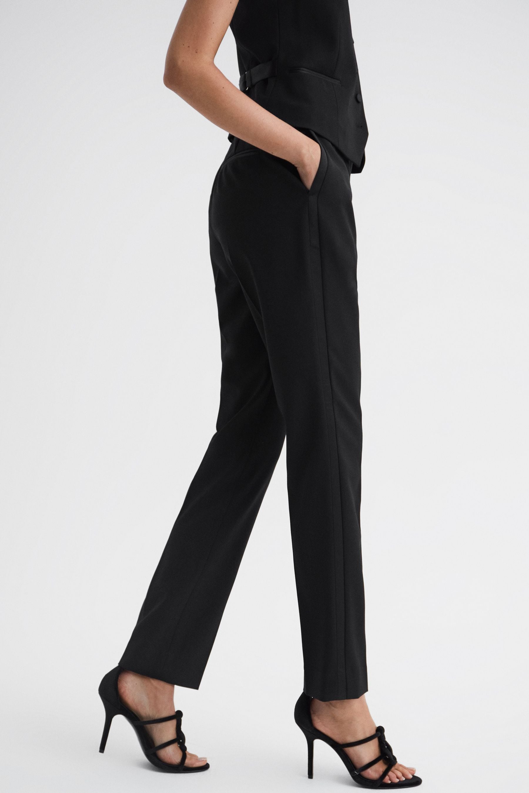 Black pants with satin stripe top