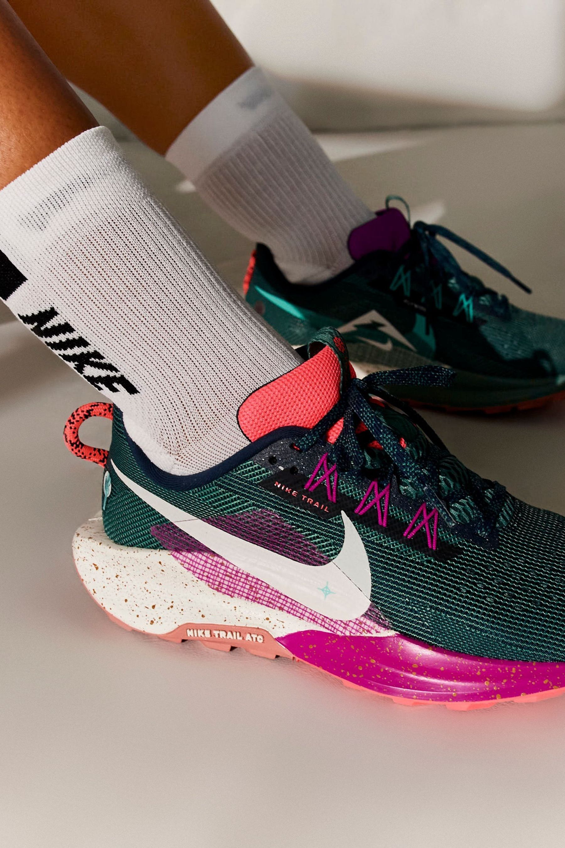 Nike women's shoes pink and green top