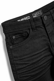Black Tapered Fit Cotton Rich Stretch Jeans (3-17yrs) - Image 3 of 3