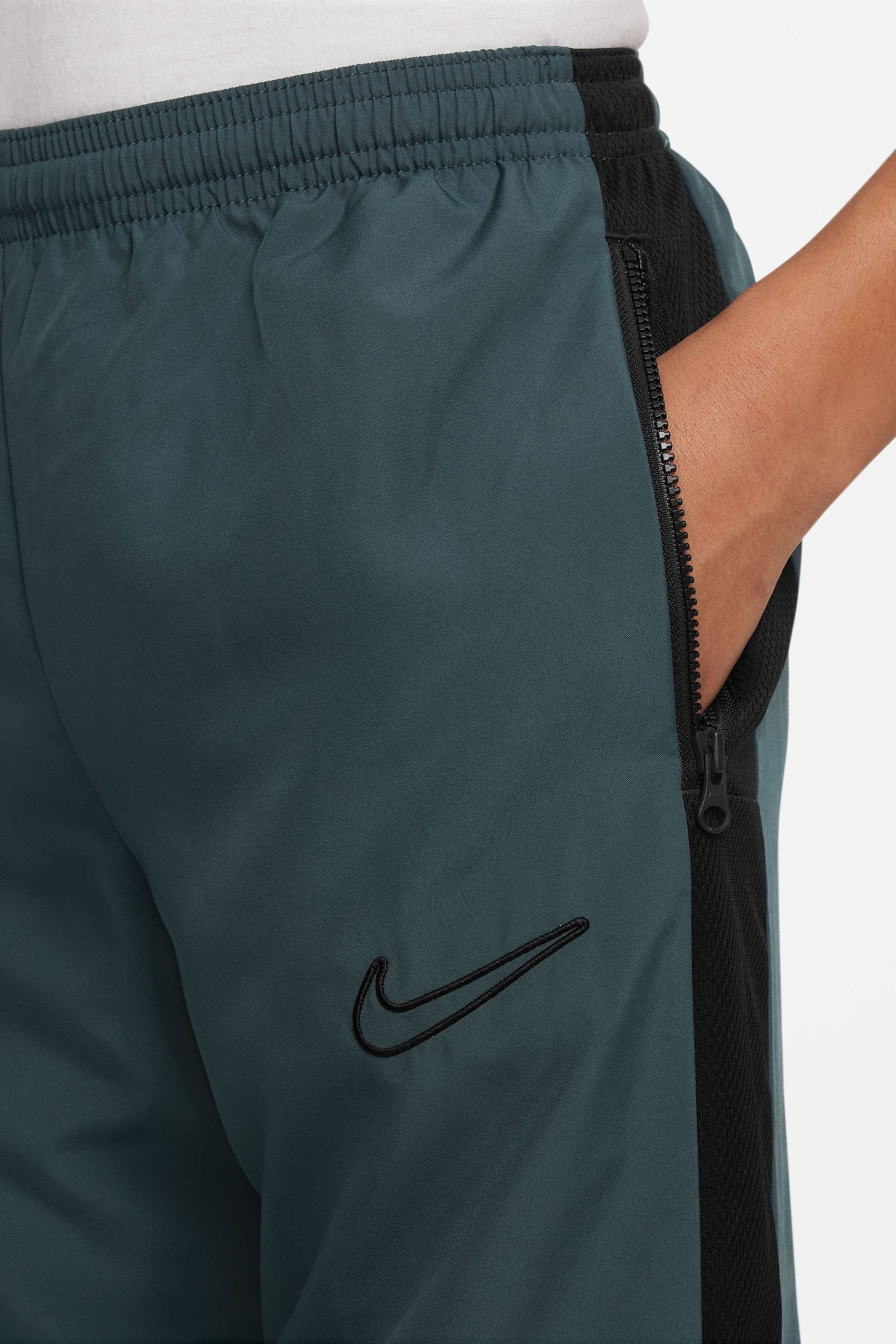 Dark green nike sweatpants top