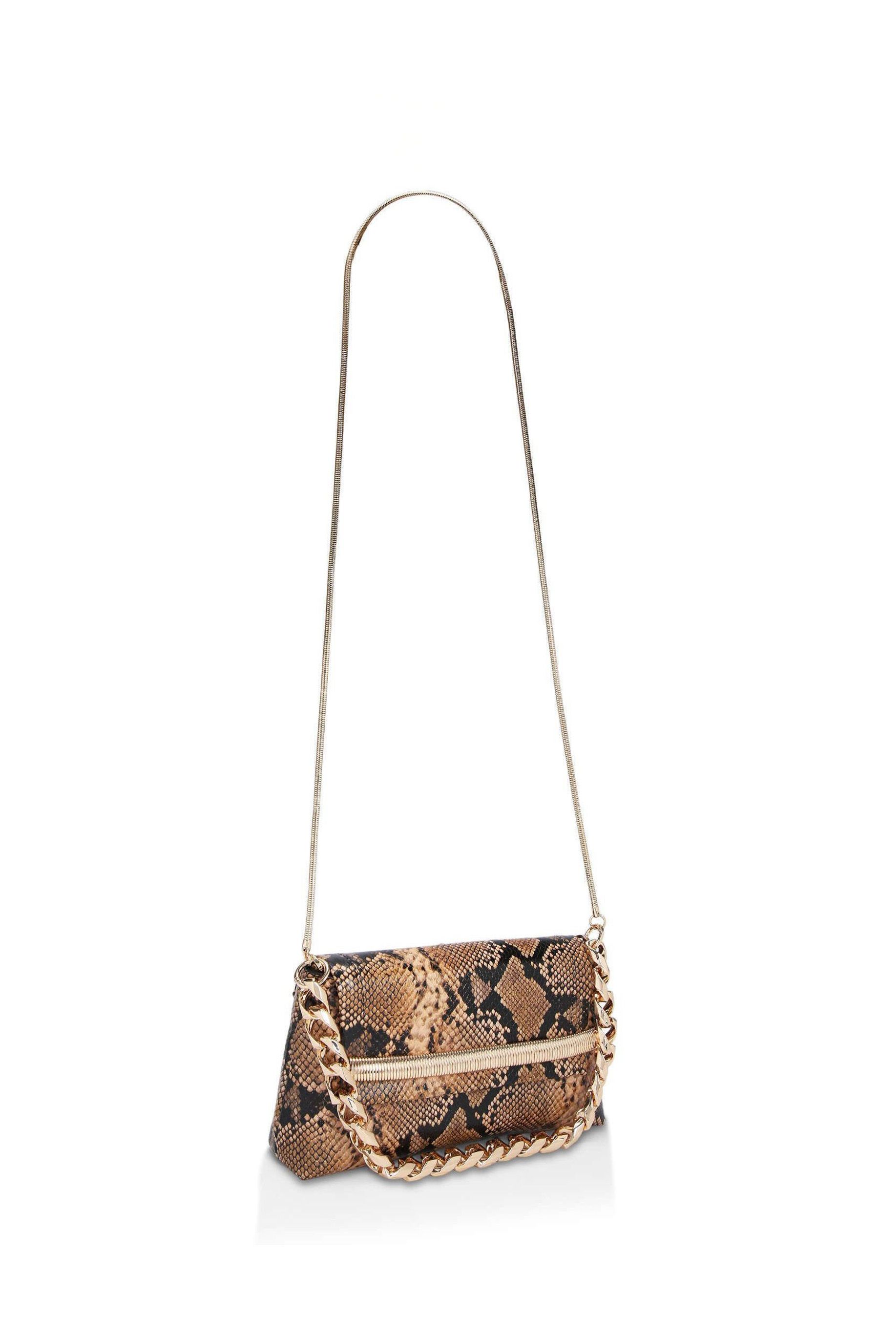 Beige snake print clutch on sale bag