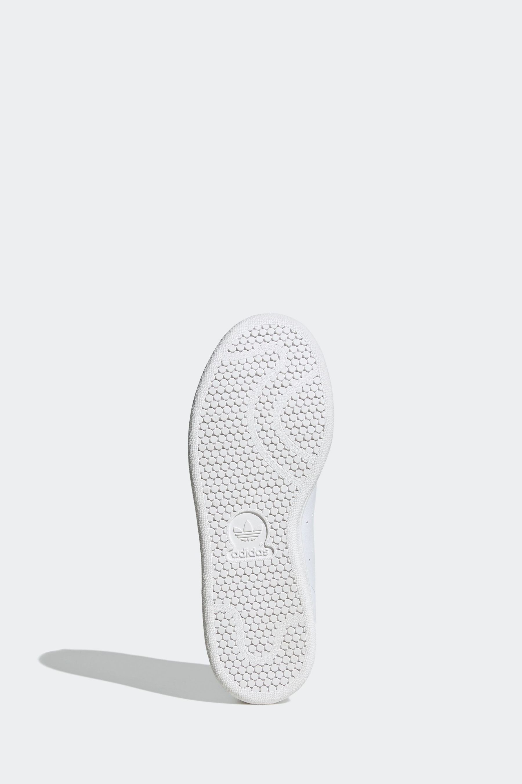Stan smith black and white sole best sale
