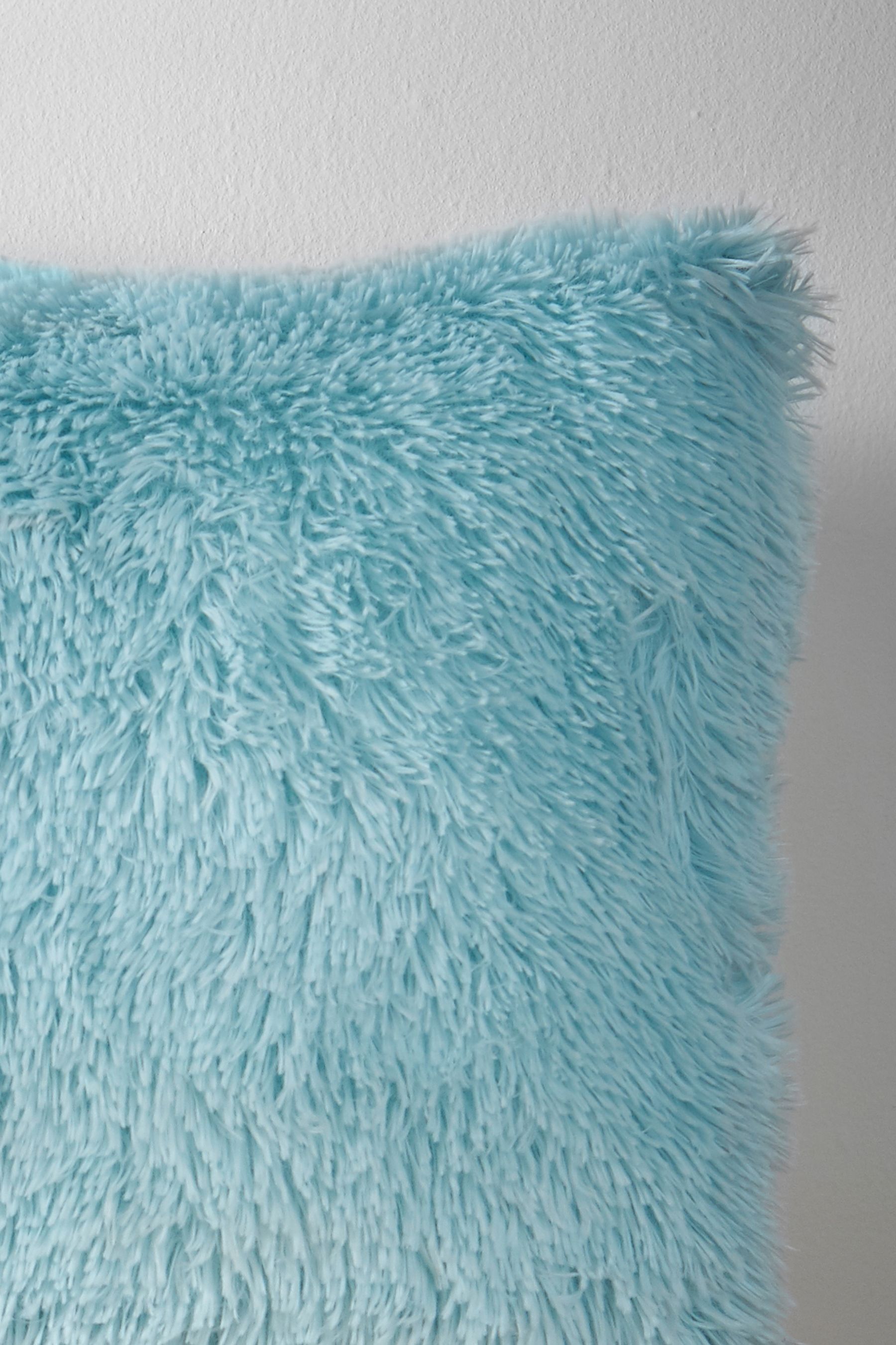 Blue fluffy cushion outlet