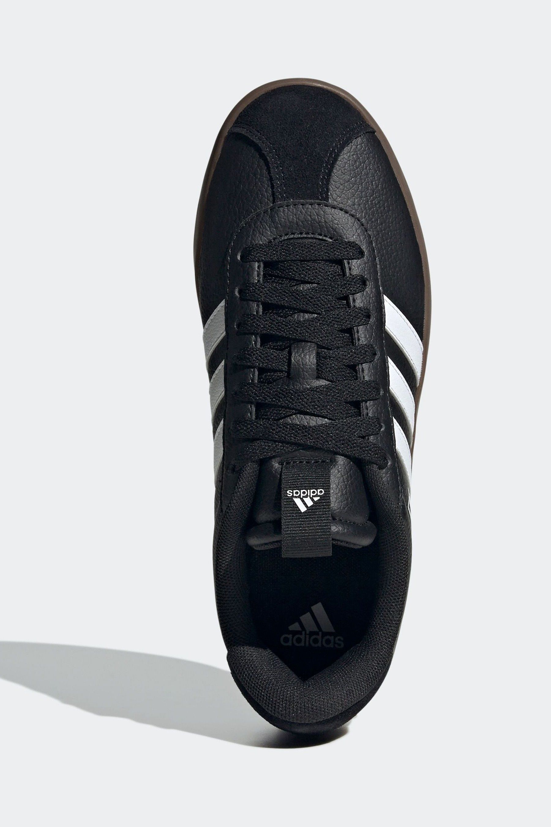Adidas black shoes with white sole best sale