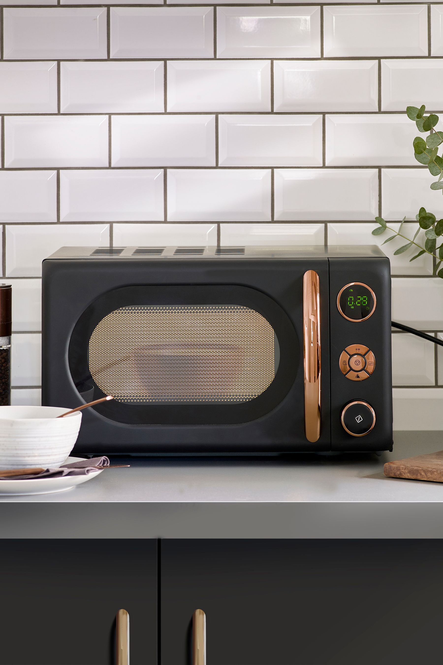 Gold and sale black microwave