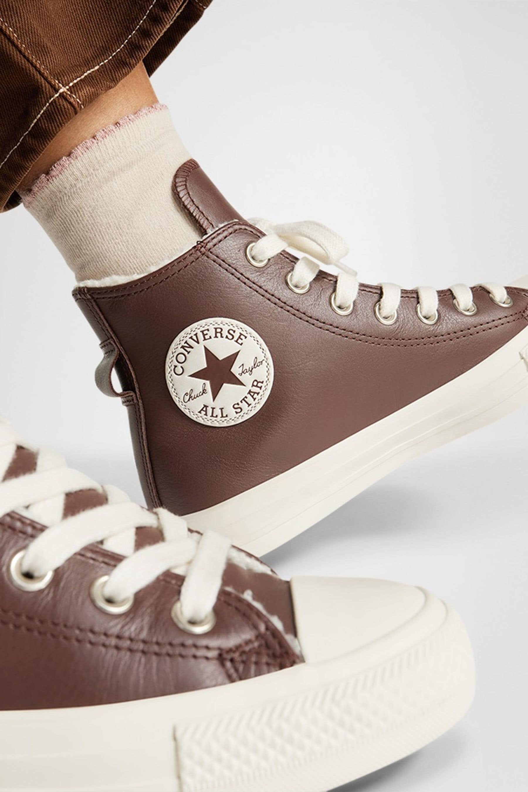 Buy Converse Brown Chuck Taylor All Star Leather Faux Fur Lining Trainers from Next Luxembourg