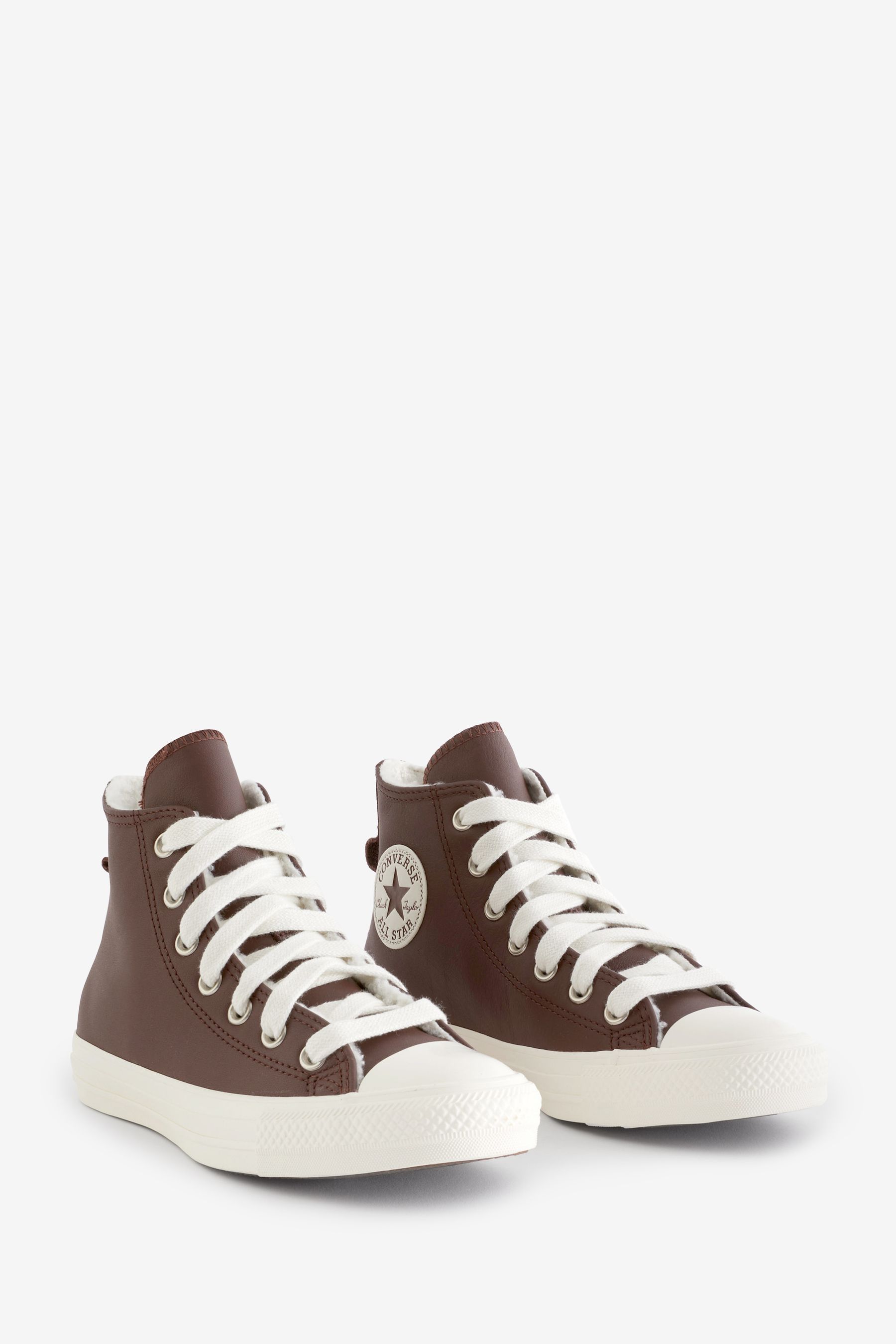 Brown leather deals converse with fur