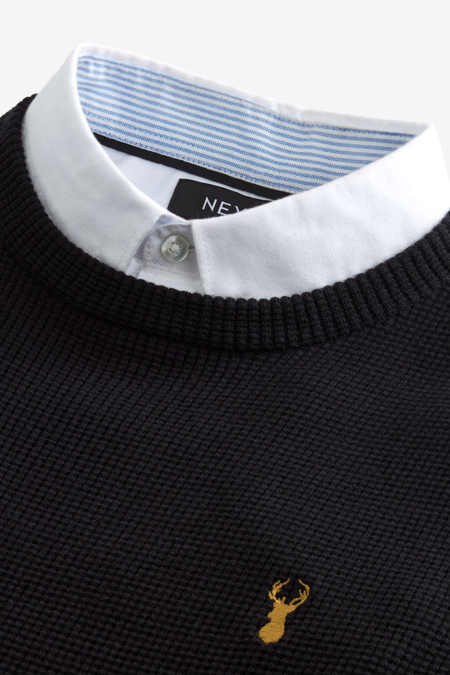 Black jumper with shirt attached outlet