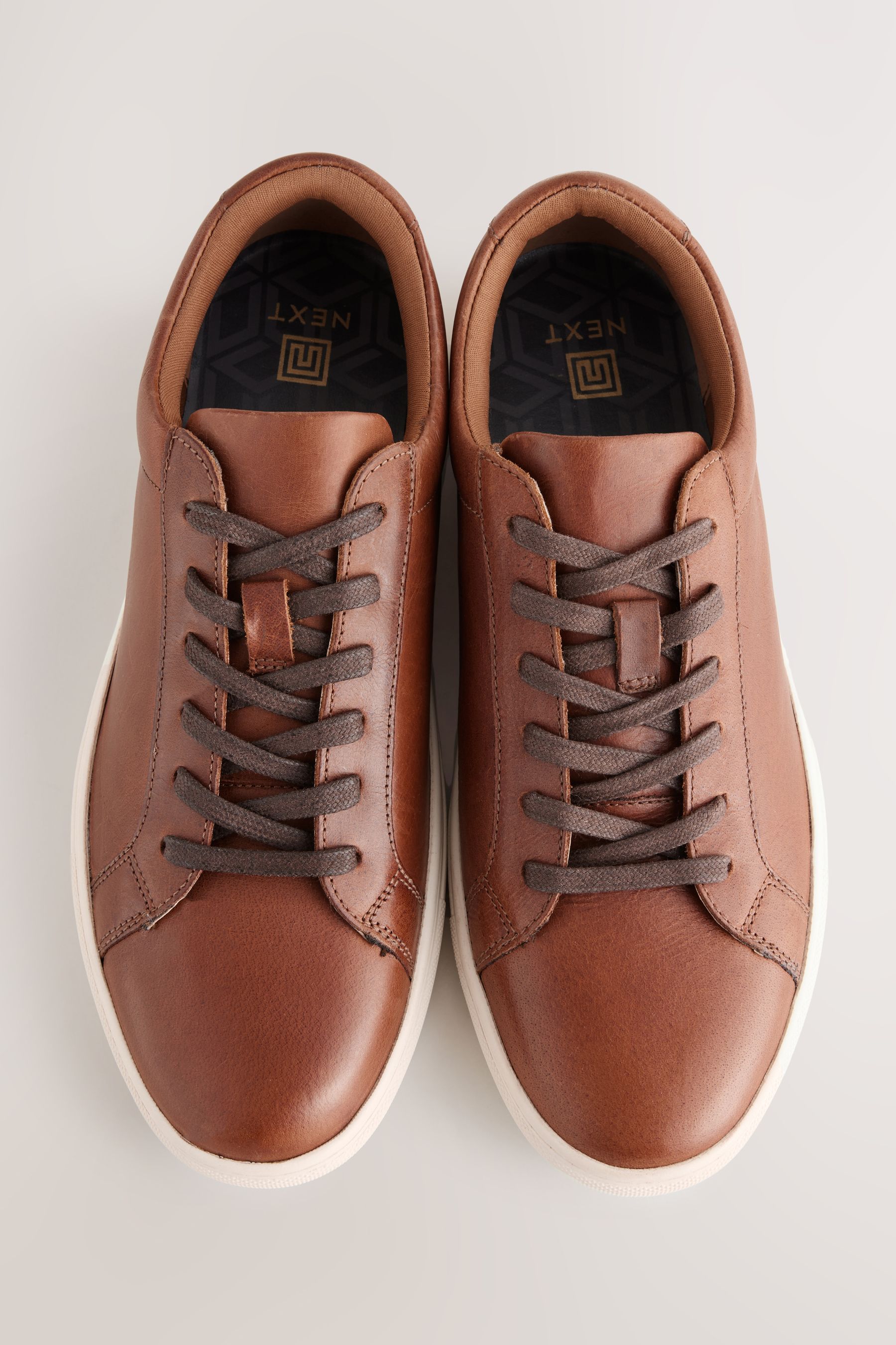Tanned trainers store